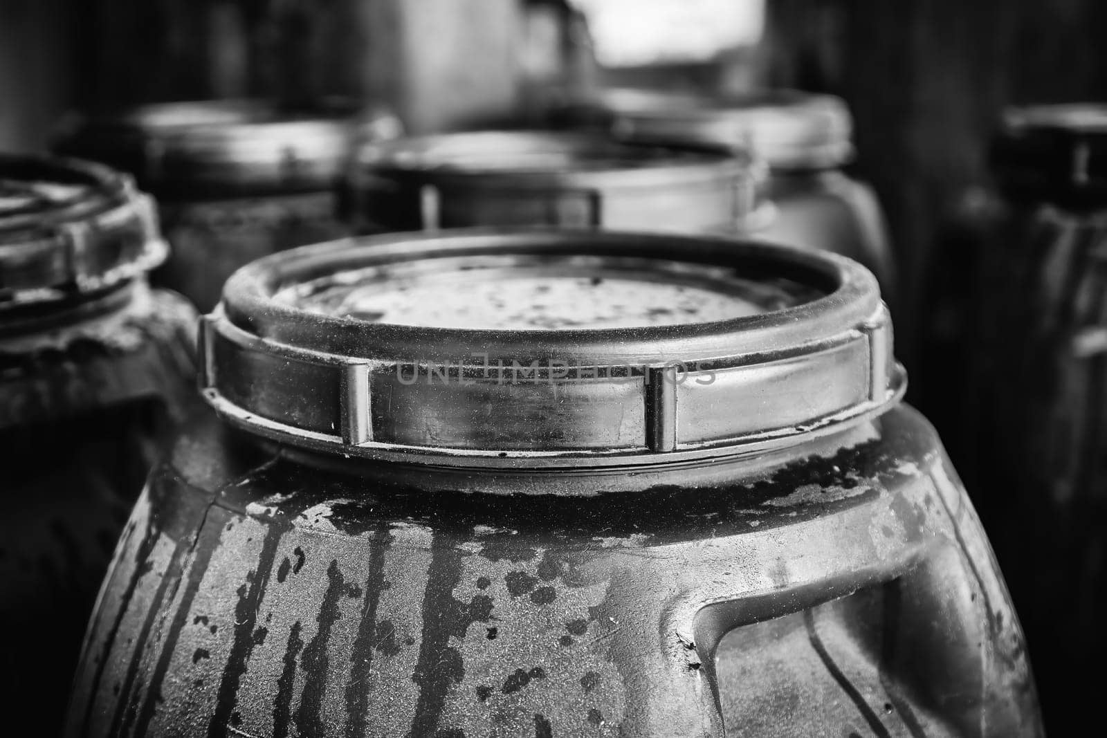 Detail of old oil barrel, pollution and recycling