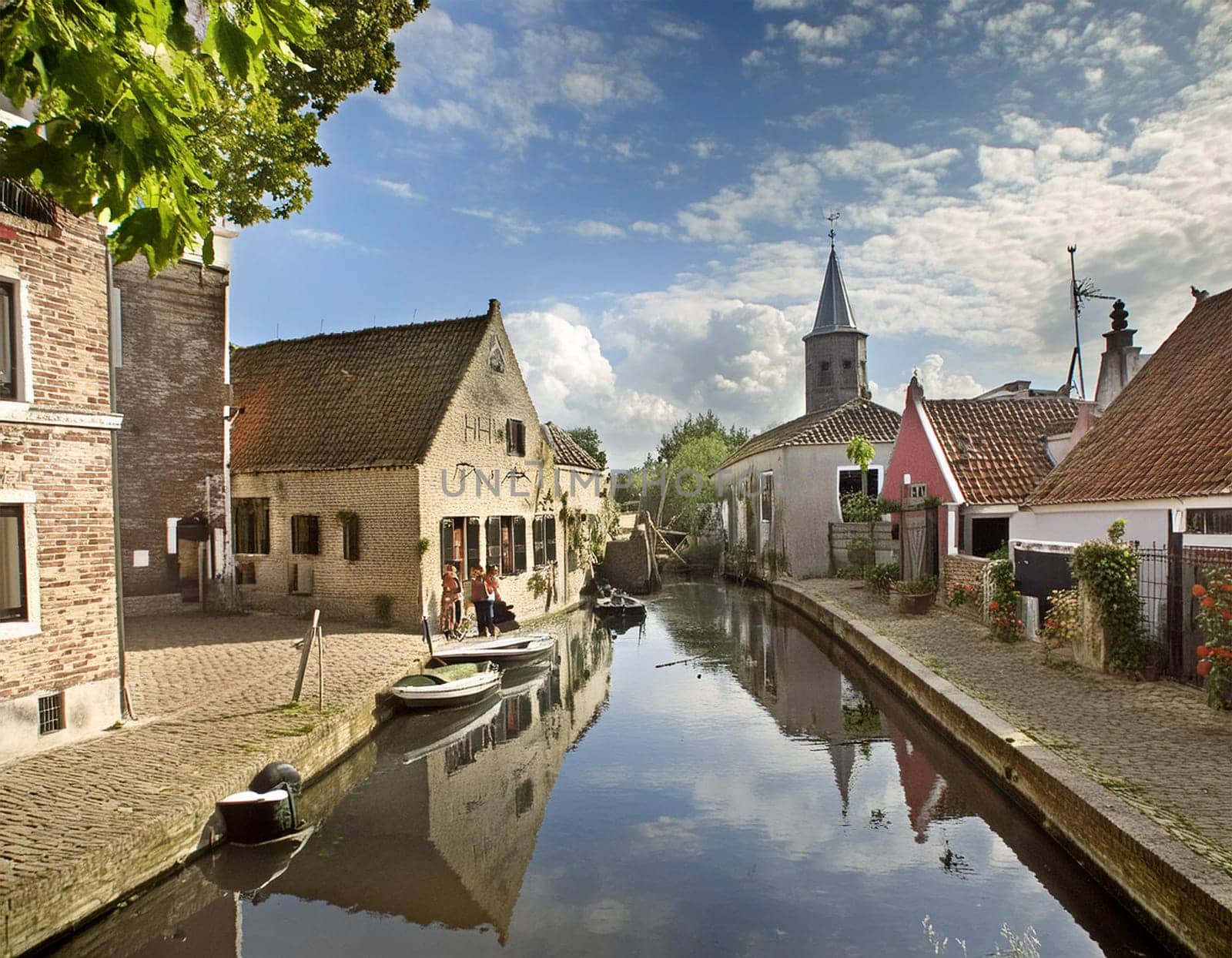 Panoramic view of old town in Europe in beautiful evening light at sunset with retro vintage Instagram style grunge filter and lens flare effect