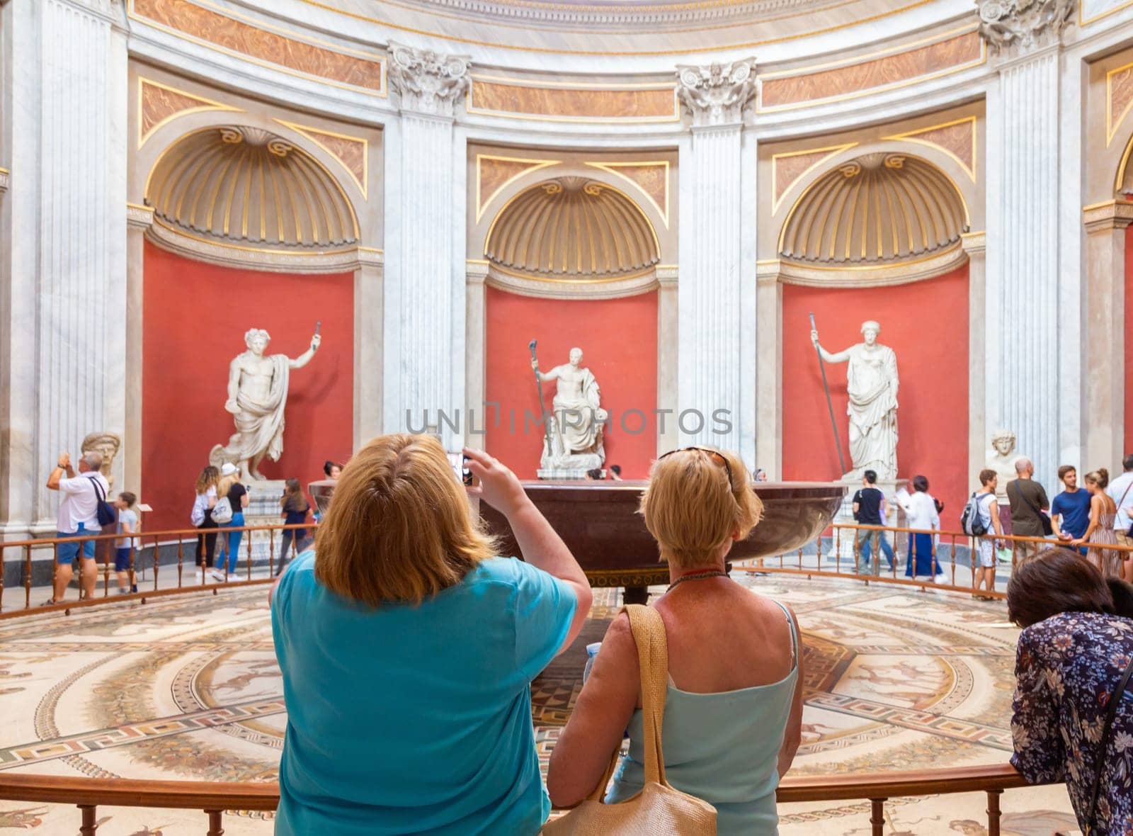 Rome, Italy - 30 April 2024. Vatican Museum interior. Turists in the Round Hall - also named Sala Rotonda - with Greek and Roman Antiquities