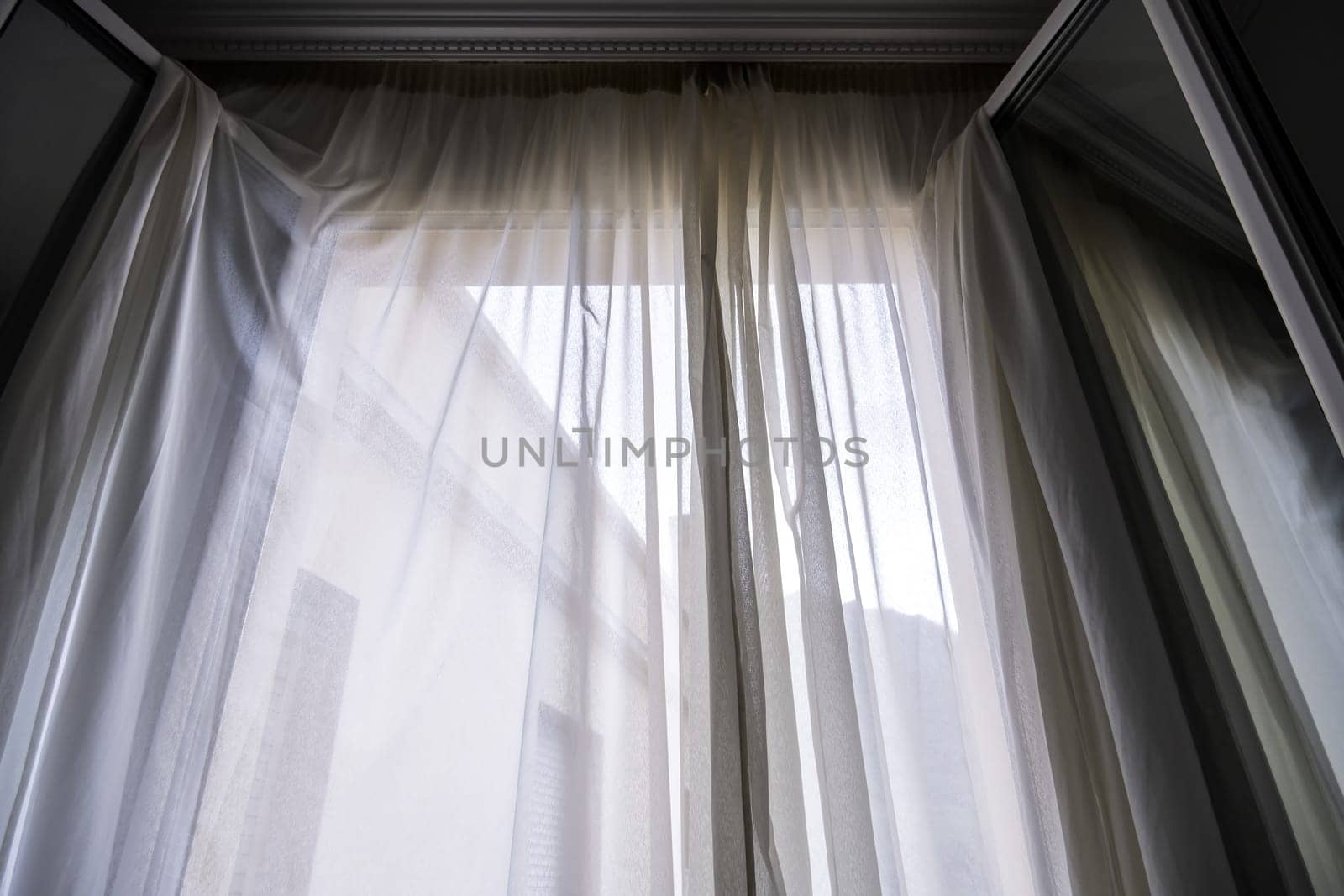 Detail of fabric curtains, privacy and decoration in the home