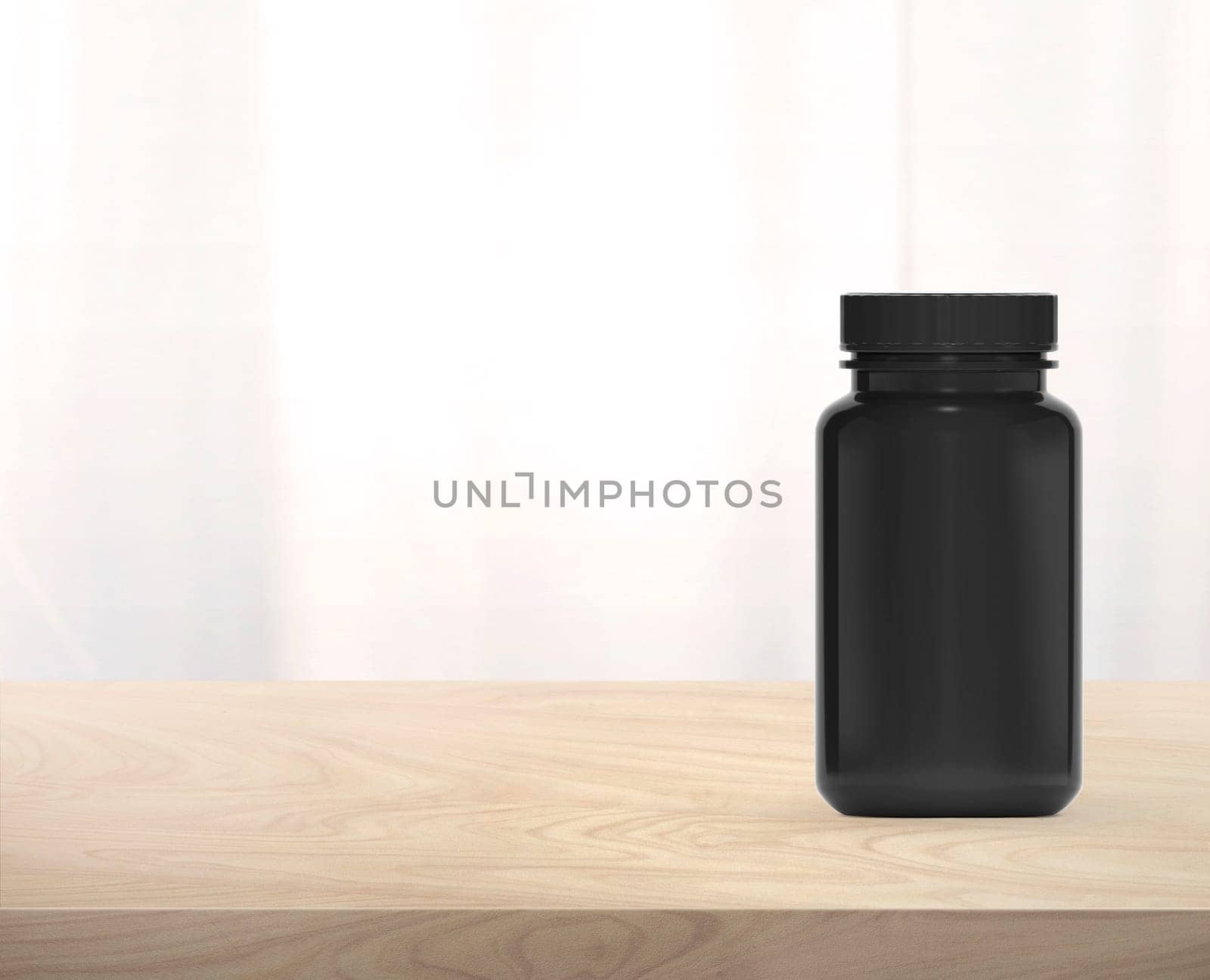 Black supplement bottle for medicine on wooden table