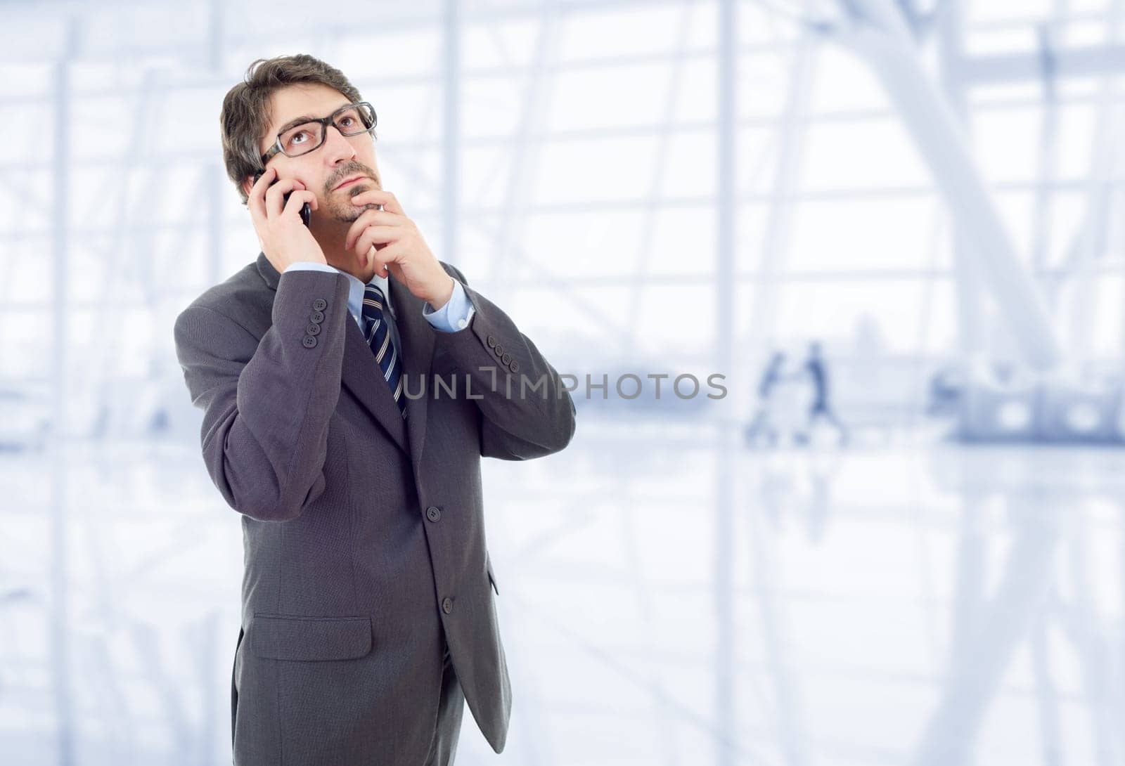happy business man on the phone, at the office