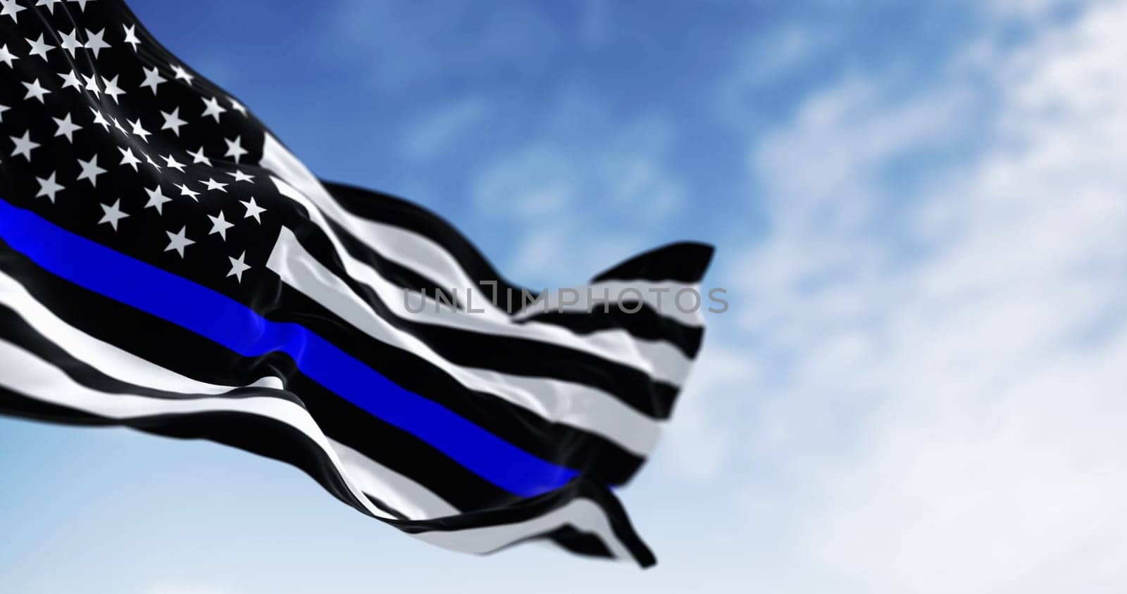 The american flag in the Thin Blue Line variant waving in the wind symbolizing support for law enforcement. 3d illustration render. Selective focus. Rippling fabric