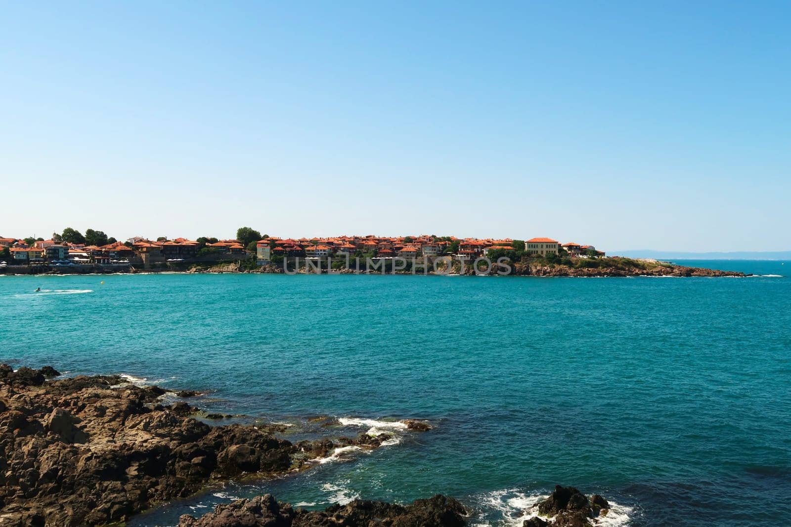 Spectacular view onto the peninsula of the old town of Sozopol, Sosopol, surrounded by the intense turquoise blue water of the black sea, Bulgaria 2022
