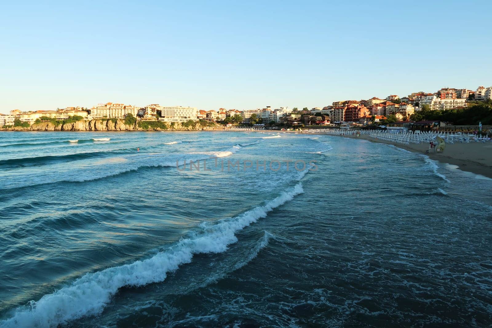 View from the Sozopol Central Beach onto the waves in the sea before sunset, Sozopol, Sosopol, Bulgaria 2022