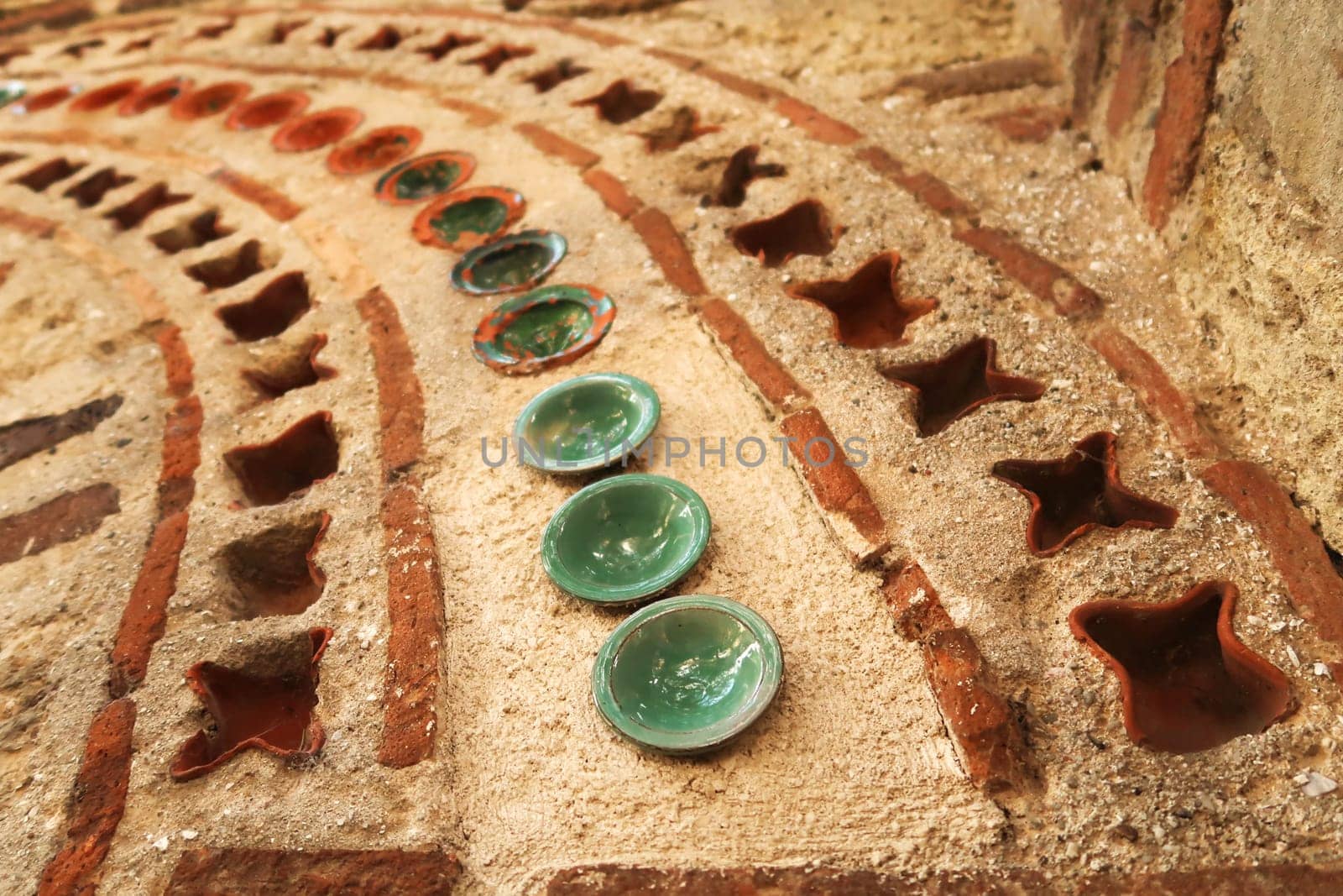 Rows of colorful tiles and bricks decorate the elaborate facade of the Church of St., Saint Paraskevi, Sveta Paraskeva in the old town of Nessebar, Nesebar, Bulgaria 2022