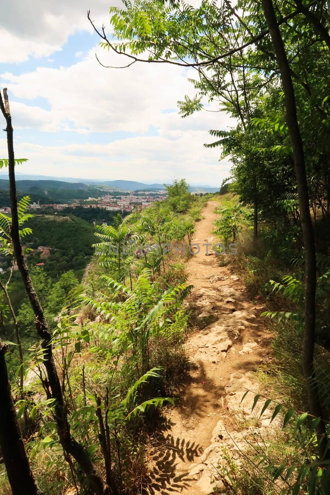 Picturesque view over the city of Veliko Tarnovo from the hiking trail along the Garga Bair Hill, Veliko Tarnovo, Bulgaria 2022