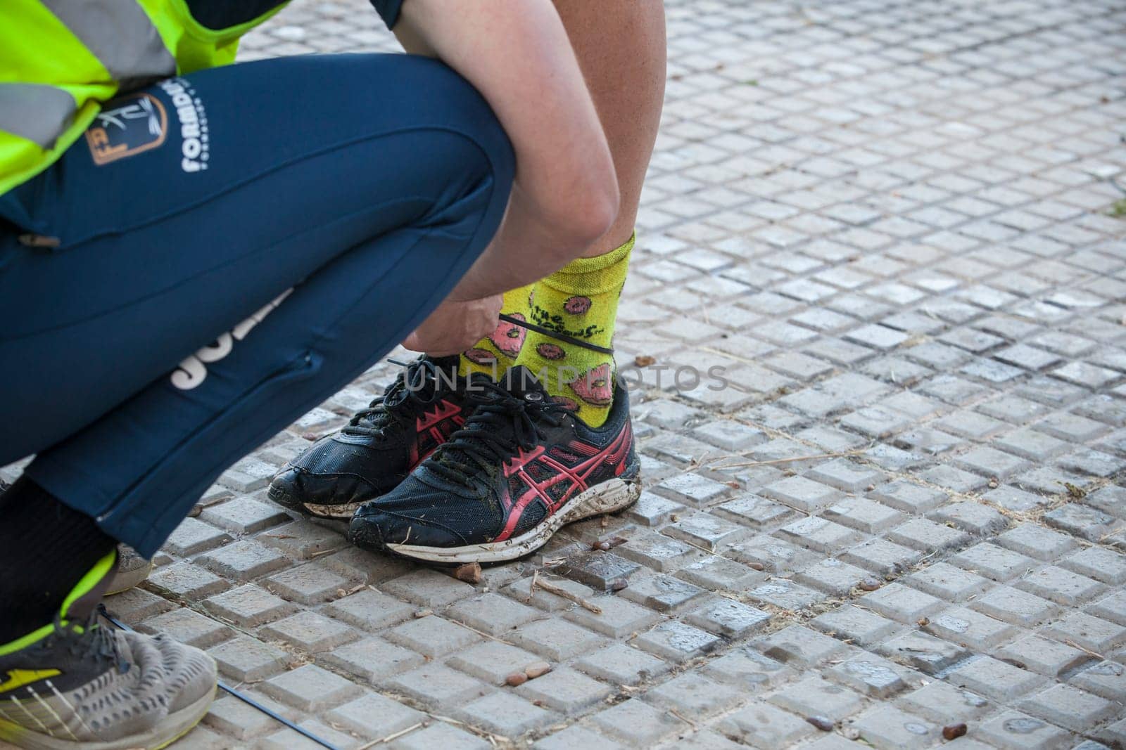 Merida, Spain - May 18th, 2024: FarinatoRace Merida 2024. Assistant fastening the bridle