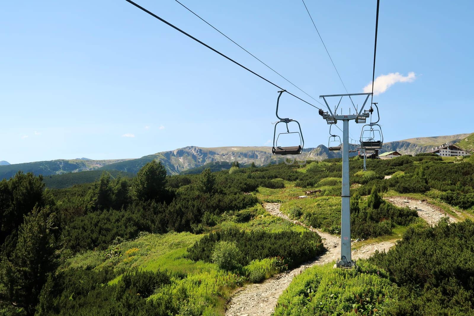 On the chairlift, lift up to the plateau of the Seven Rila Lakes in the Rila National Park, the lift station and the Rila Lakes Chalet can be seen at the top, close to Sofia, Bulgaria 2022