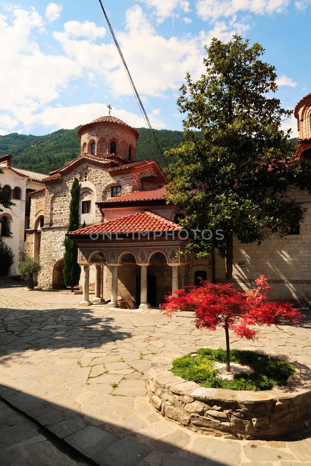 View over the courtyard to the St., Saint Archangels Michael and Gabriel Church, Bachkovo Monastery, close to Plovdiv, Bulgaria 2022