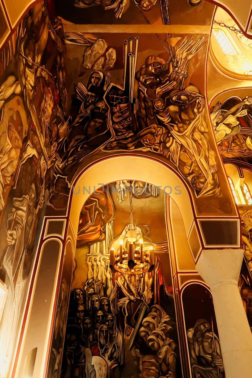The interior of the Patriarchal Cathedral, Church of the Holy Ascension of the Lord, completely covered in modernist murals, wall paintings, frescos showing scenes from the history of Bulgaria, Tsarevets Fortress, Veliko Tarnovo, Bulgaria, 11th of July 2022