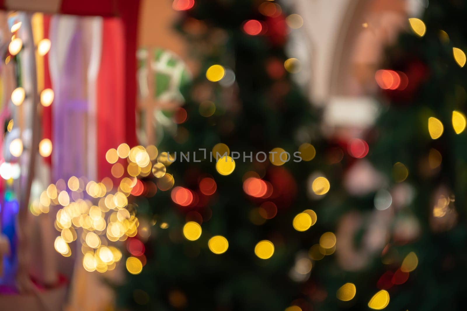 Blurry colorful Christmas bokeh lights festive background
