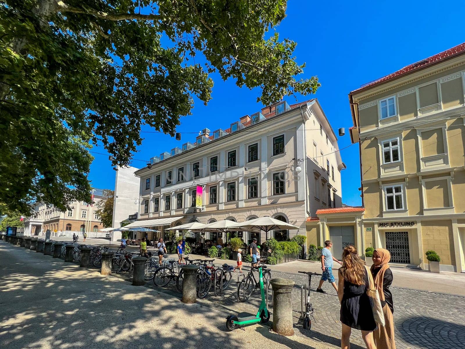 A cafe on Kongresni Trg street, view of people on the street