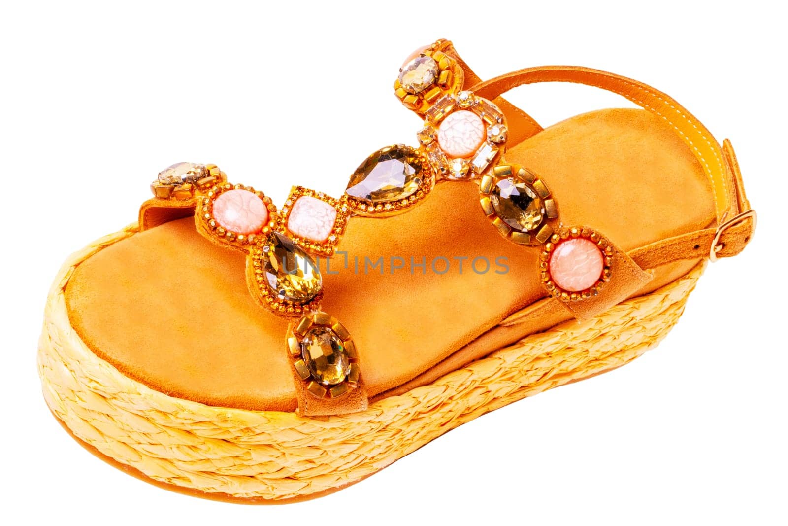 Leather shoes isolated. Close-up of a single of elegant female suede sandals with rhinestones. Isolated on white background. Macro. Clipping path.