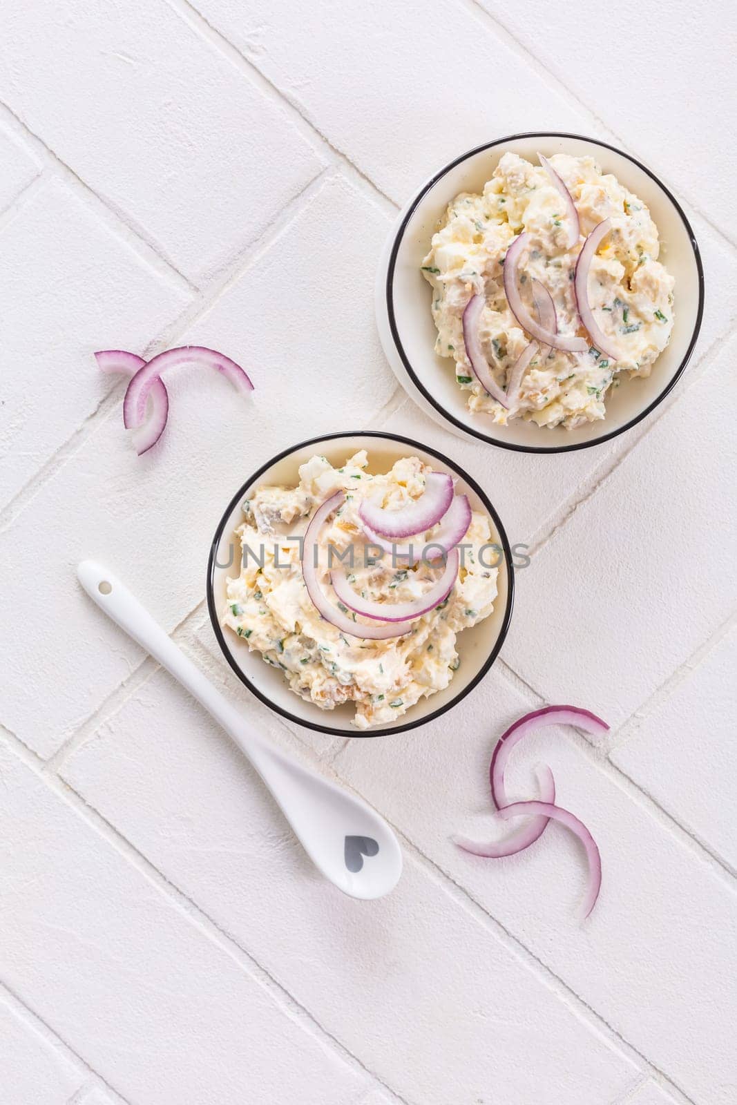 Fish and egg spread, paste or salad with red onions