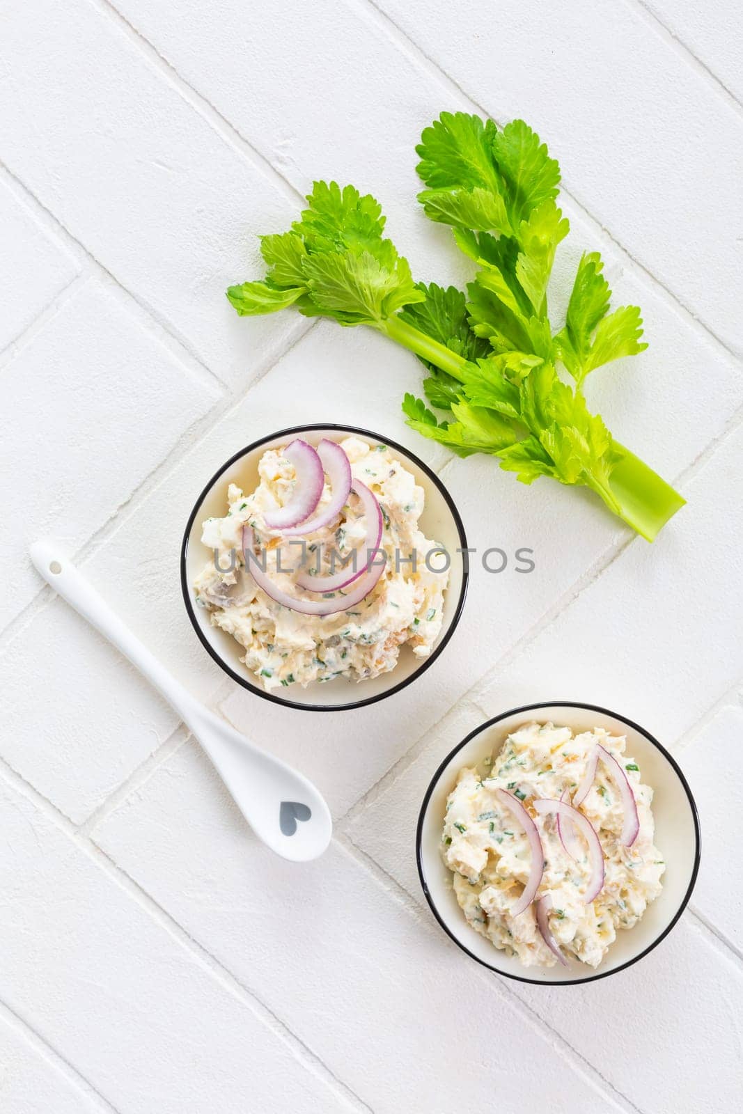 Fish and egg spread, paste or salad with red onions
