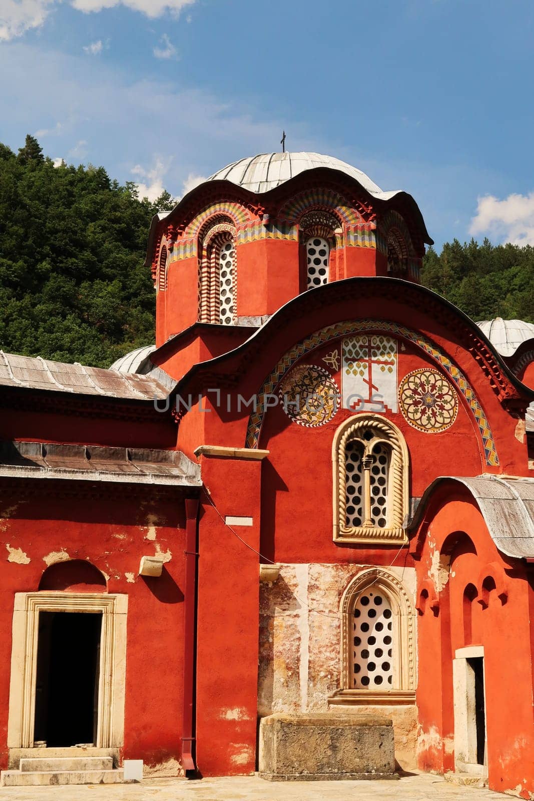 The elaborate facade with two entrance doors and roof, dome, cupola of the Church Complex of the Patriarchate of Pec Monastery, outside of Peja, Kosovo 2022