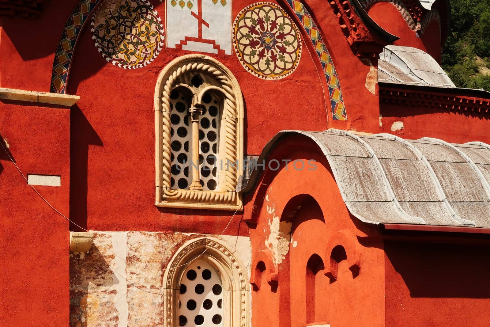 Details and windows on the elaborate facade of the Church Complex of the Patriarchate of Pec Monastery, outside of Peja, Kosovo 2022