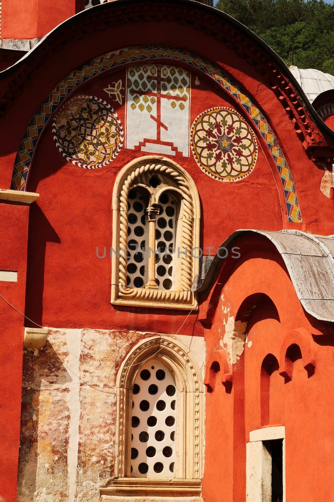 Elaborate details around the windows on the facade of the Church Complex of the Patriarchate of Pec Monastery, outside of Peja, Kosovo 2022