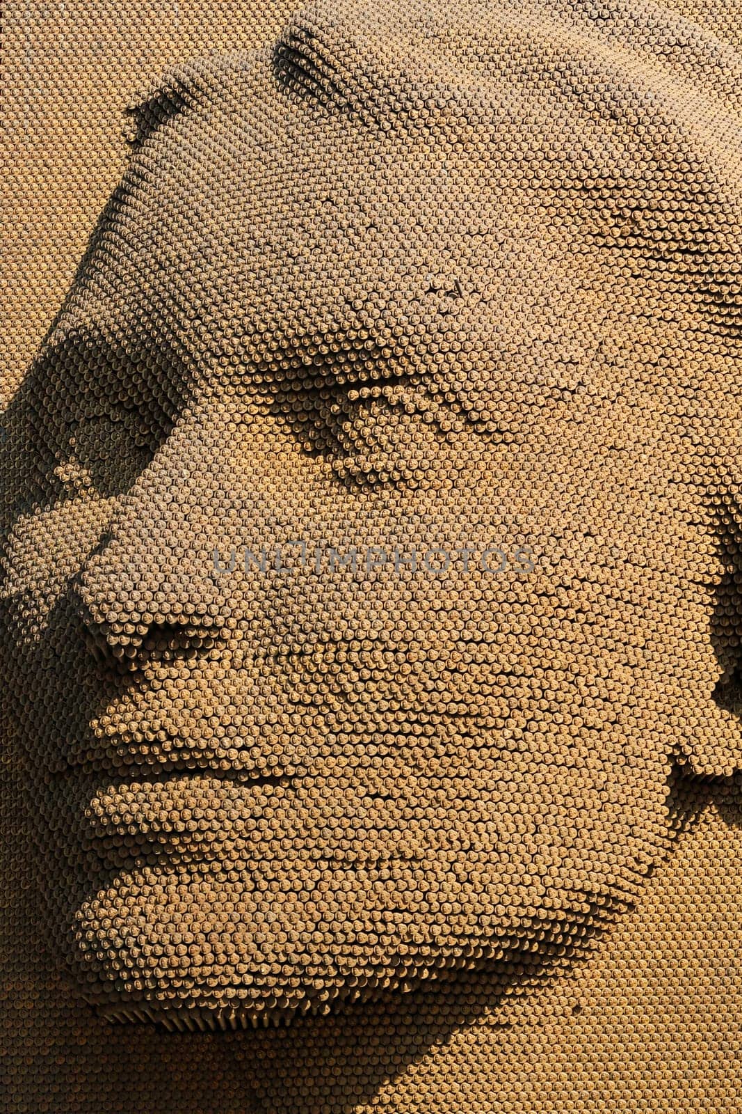 The beautiful womans face of the Heroinat Memorial, a sculpture in the city center of Prishtina, Pristina to commemorate the crimes commited against women in the Kosovo war, Kosovo, 25th of July 2022