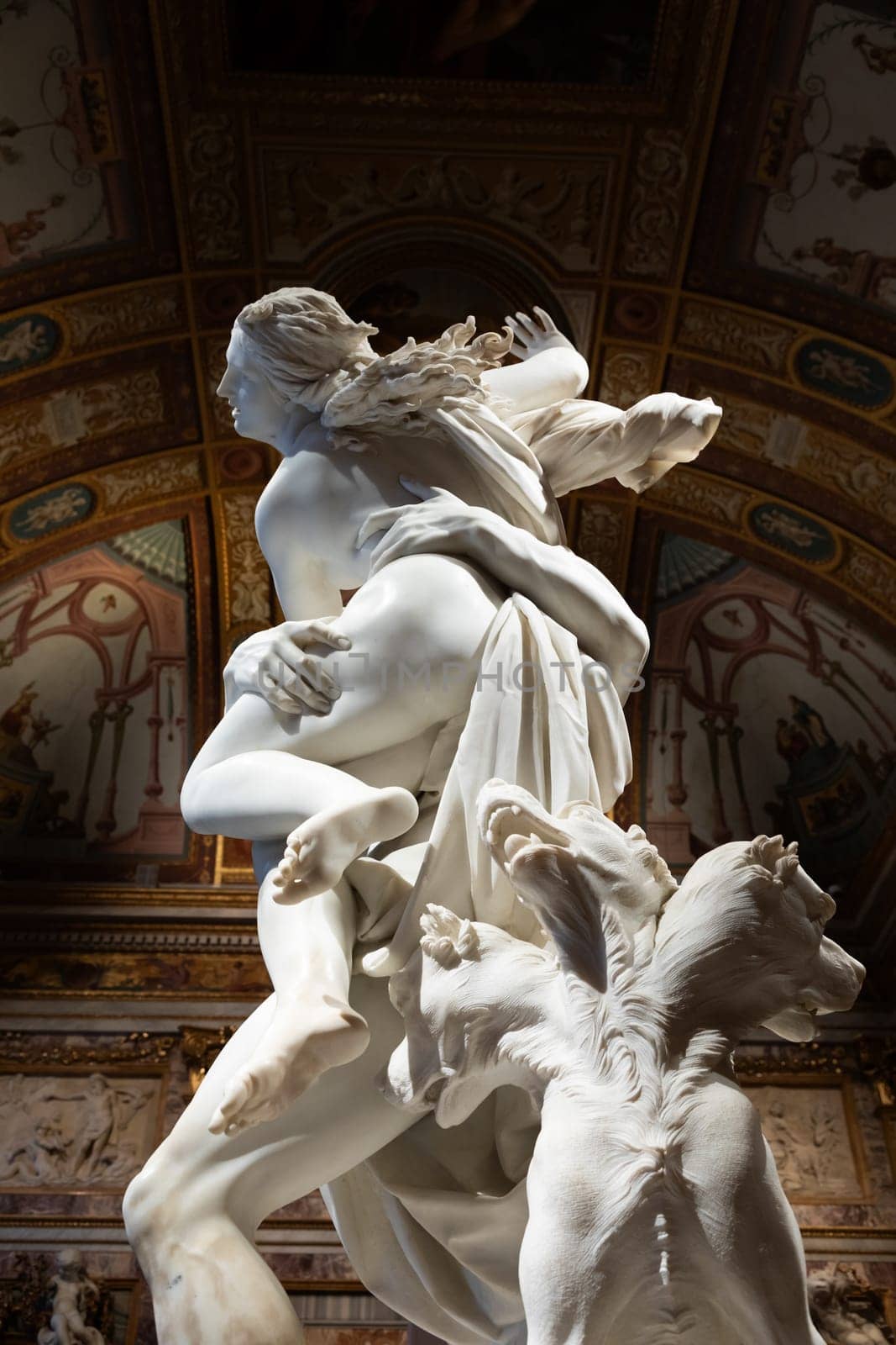 Rome, Italy - 28 December 2023: Galleria Borghese - Borghese Gallery - The rape of Proserpina, by Gian Lorenzo Bernini, 1622 - white Carrara marble statue