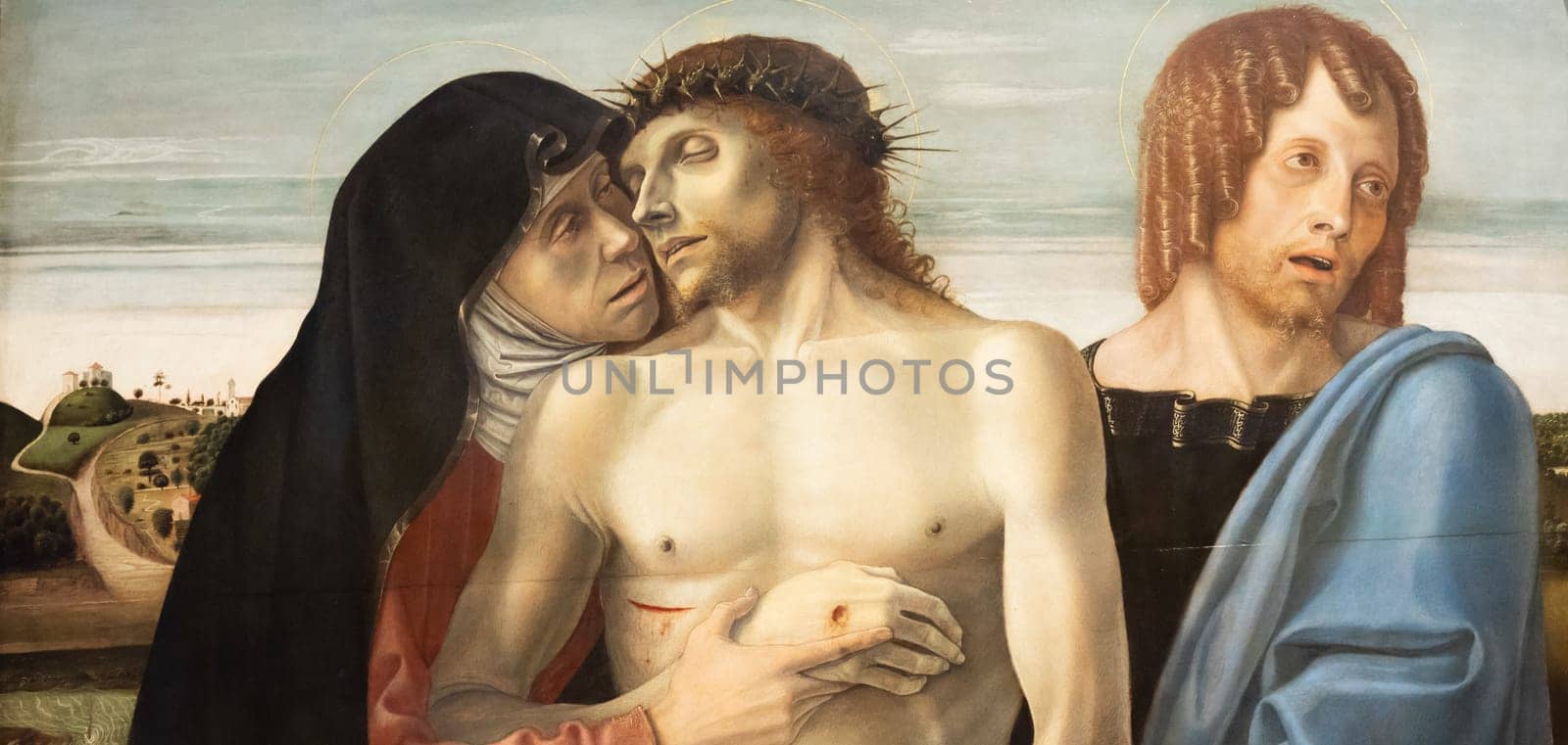 Milan, Italy - 23 September 2023: Brera antique painting museum. The pity, Pietà, by Giovanni Bellini, 1460
