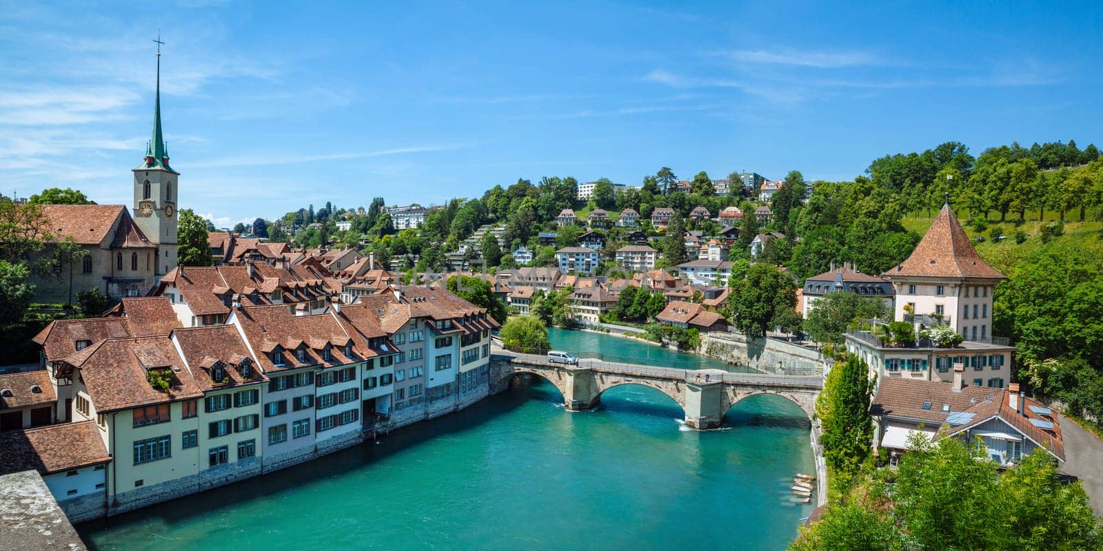 City of Bern, Switzerland. View of the old city center and Nydeggbrucke bridge over river Aare.