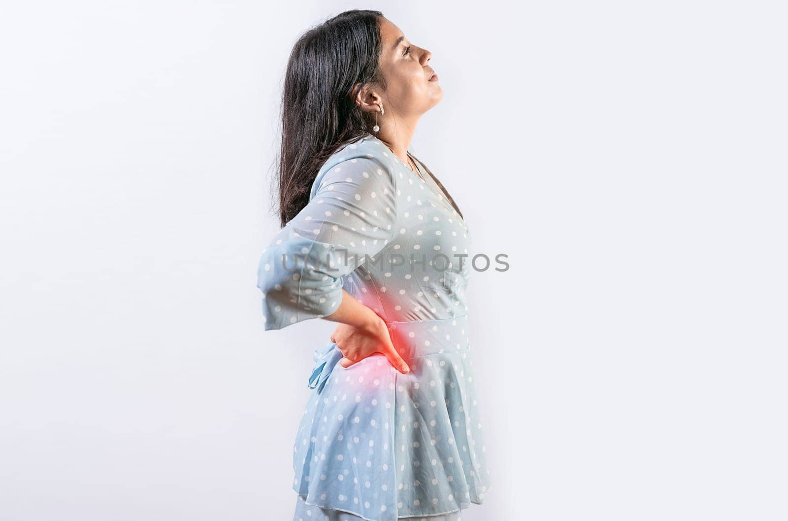 Suffering girl with back pain isolated. Young woman with spine problems isolated. Person with back pain. lumbar problems concept