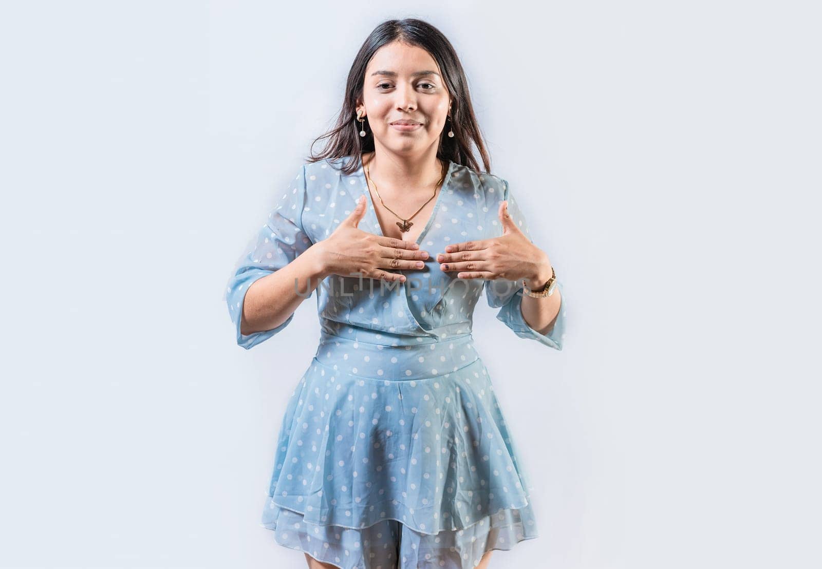 Girl gesturing the word THANKFUL in sign language. Person gesturing  GRATEFUL in sign language.
