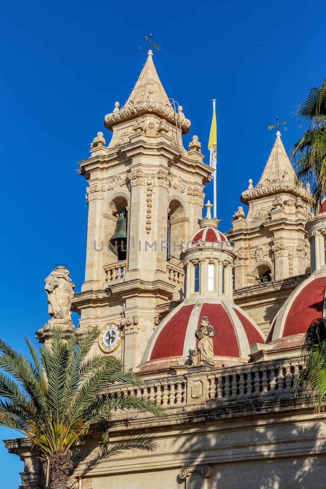 Majestic Zabbar Parish Church in Malta, a symbol of faith and heritage, standing tall against the evening sky at sunset. Cultural heritage of Malta