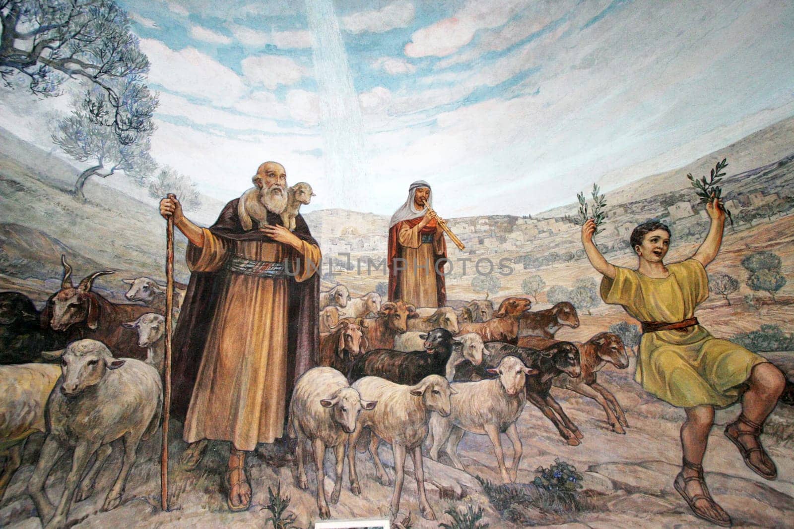 A mural in the Church of the Shepherds` Field near Bethlehem, depicting shepherds rejoicing when angels told them that Jesus Christ was born in this place