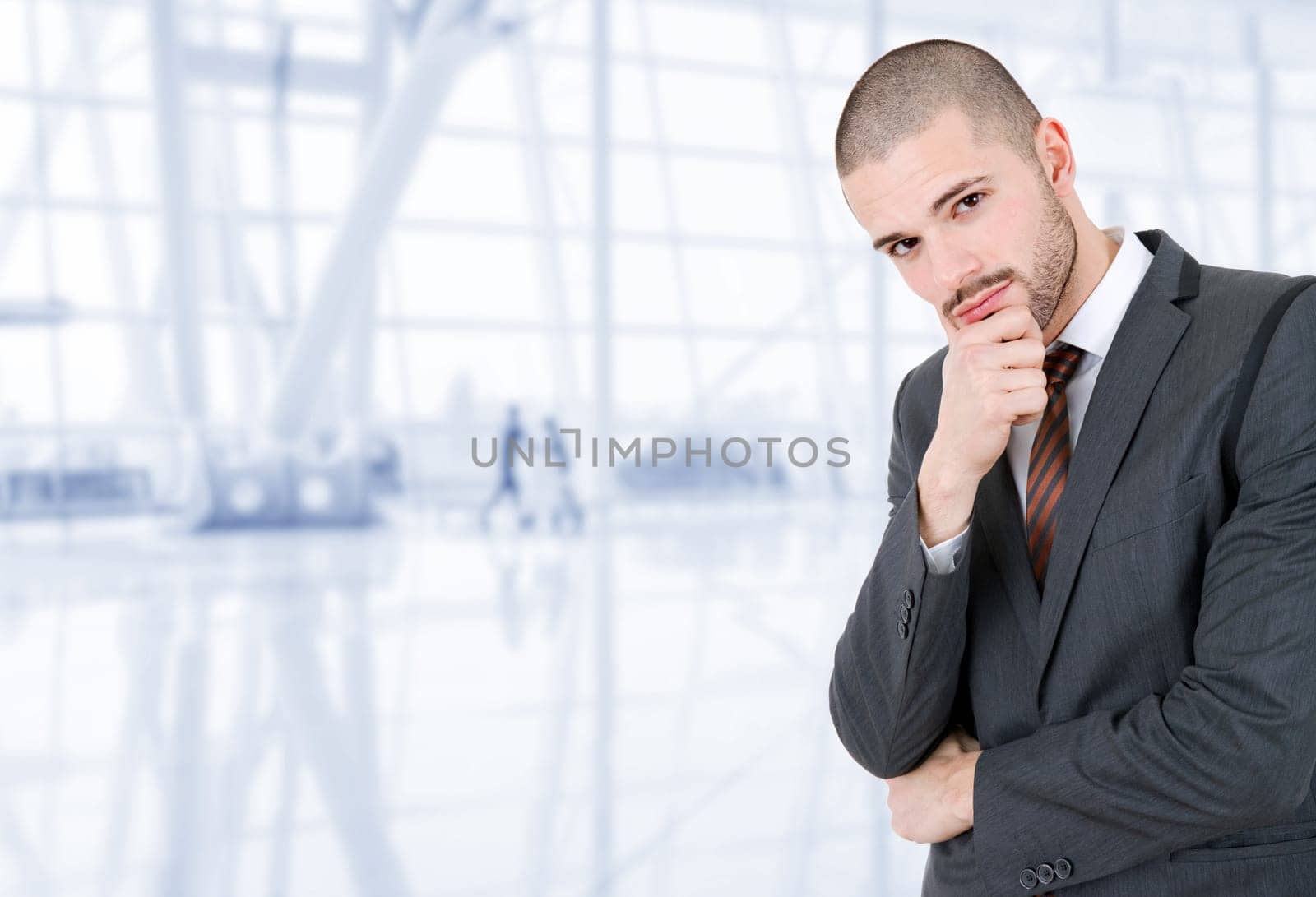 young business man portrait at the office