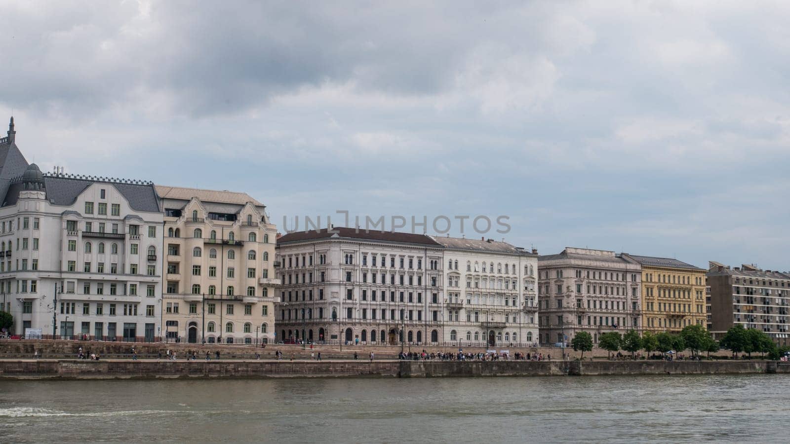 BUDAPEST-HUNGARY - 2023-05-06: General view of buildings lining the River Danube (on east, Pest side viewed from West Buda side) in Budapest, Hungary.