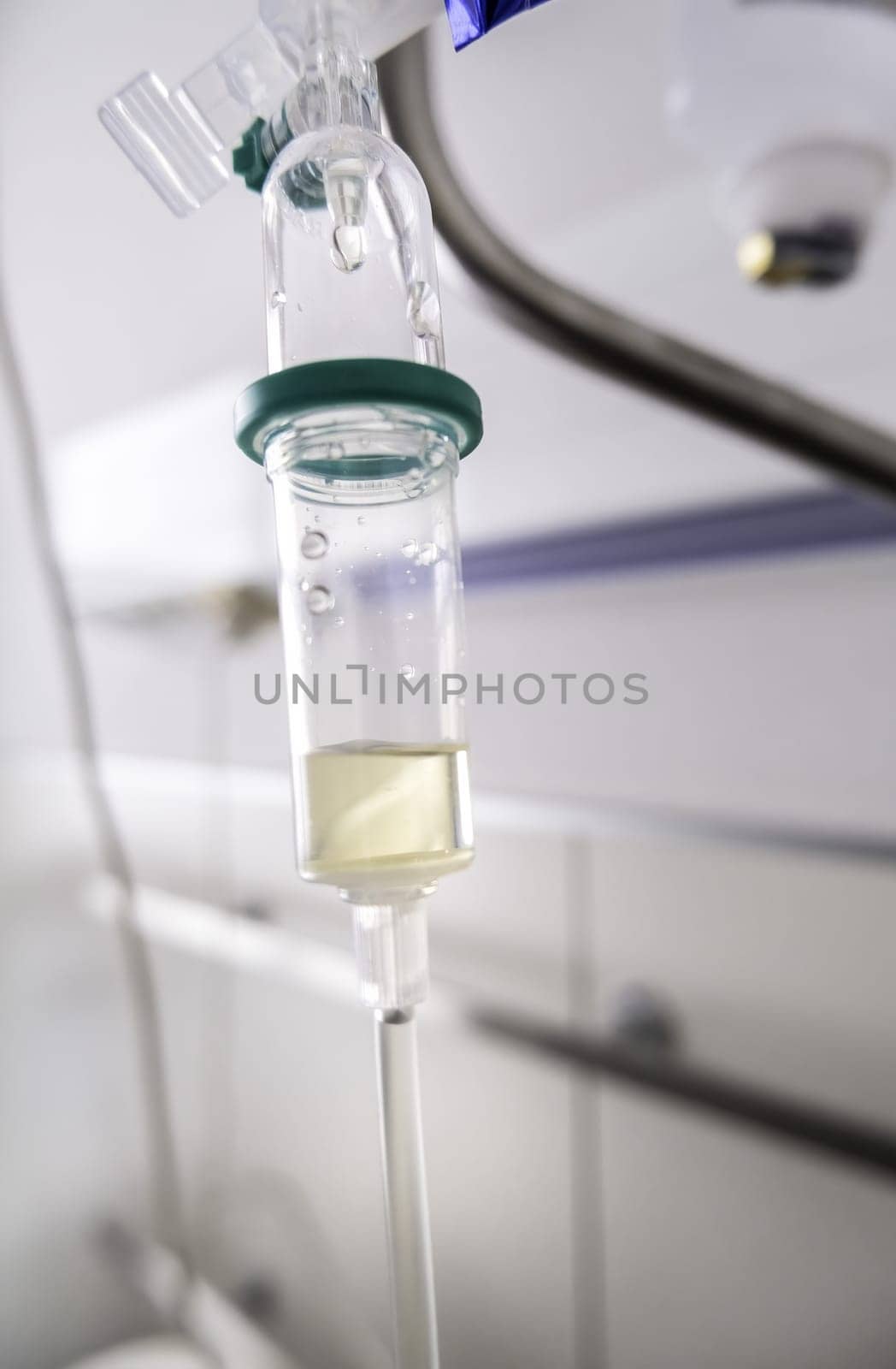 Detail of intravenous medication in a hospital, illness
