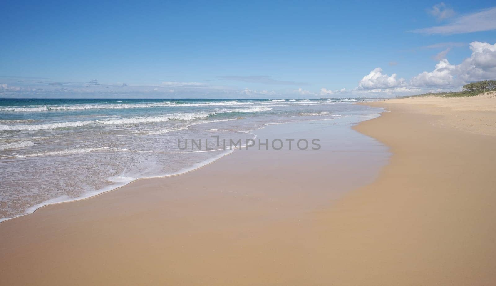 A panorama of an iconic Australian beach scene for background image template for advertising holiday travel to Caloundra Sunshine Coast Queensland