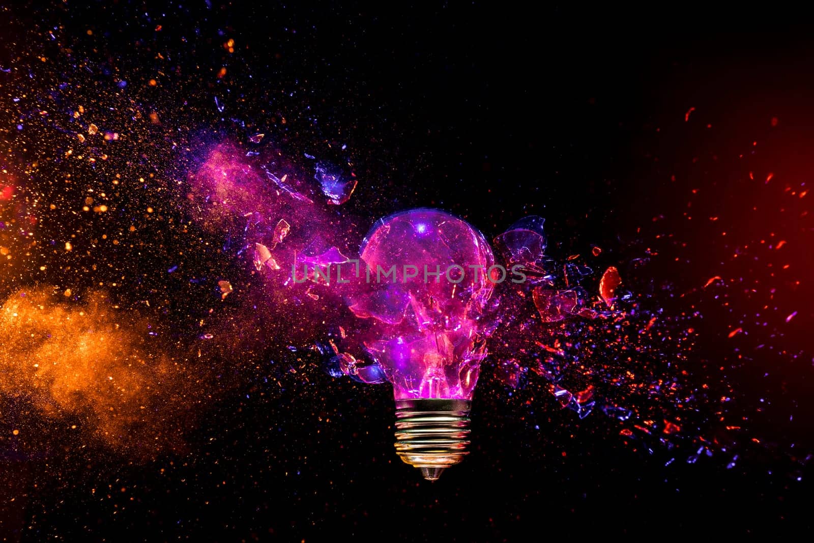 Dynamic image  shattering light bulb h vibrant color sparks background