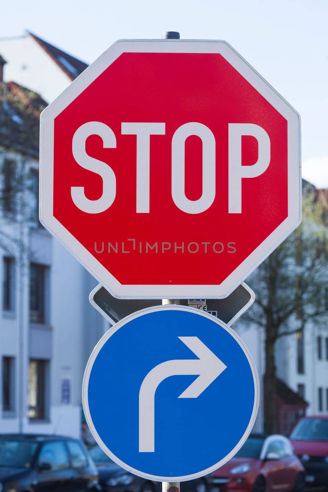 Stop sign, traffic sign Stop! Give way, Stop, traffic sign, direction arrow to the right, Germany