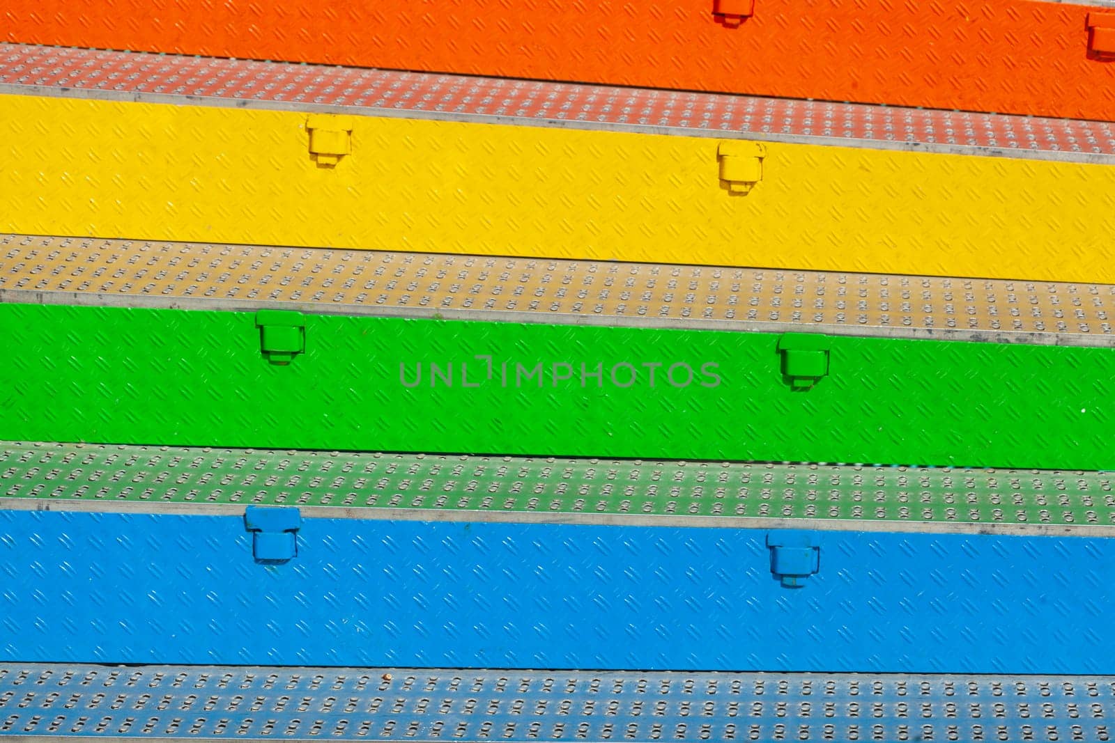 Colorful metal stair treads made of checker plate, Germany
