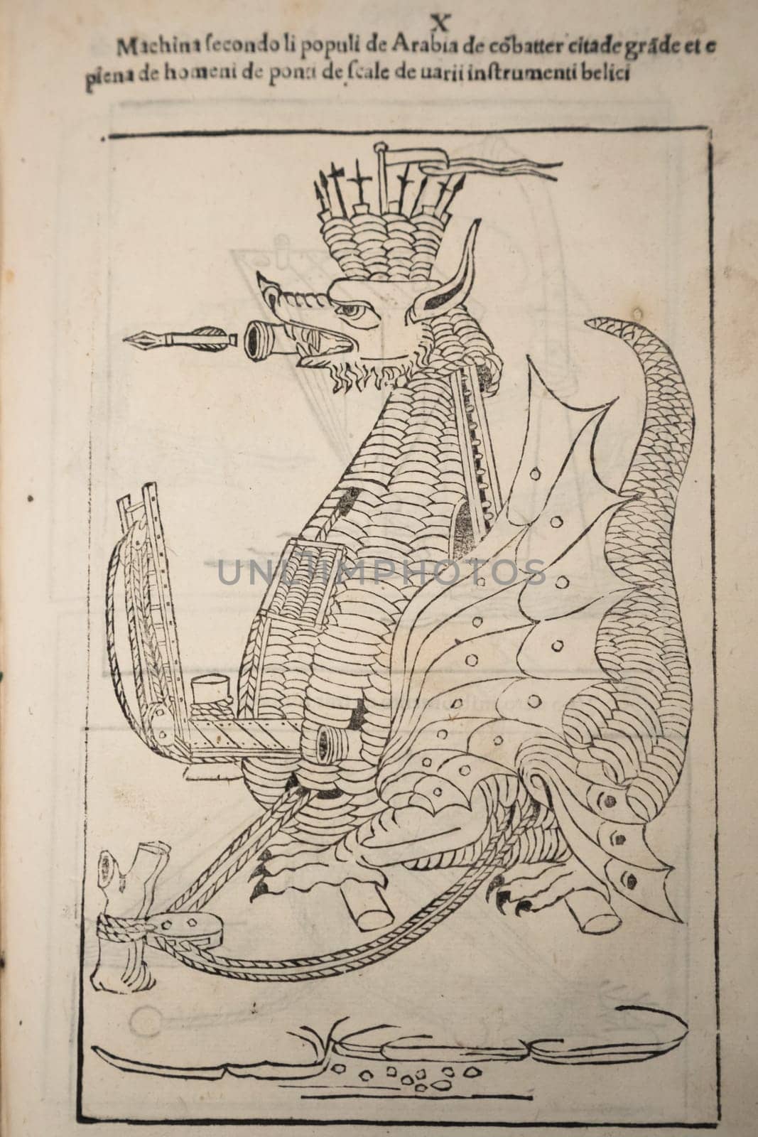 Turin, Italy - 30 April 2024. Ancient book De re militari by Roberto Valturio, 1483. Compendium of military theories from antiquity.