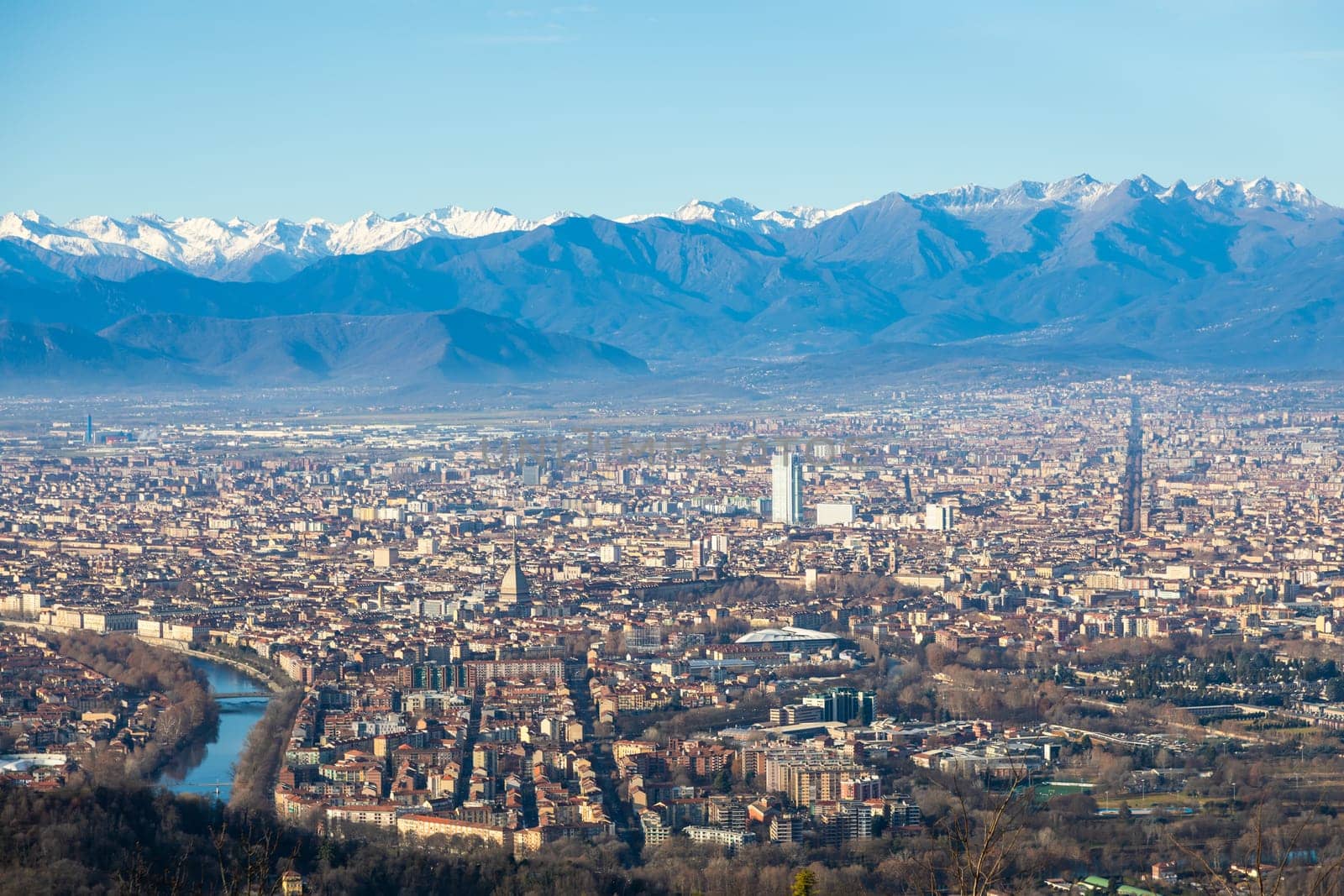 Turin, Italy - 24 December 2023: panoramic view with Alps and blue sky