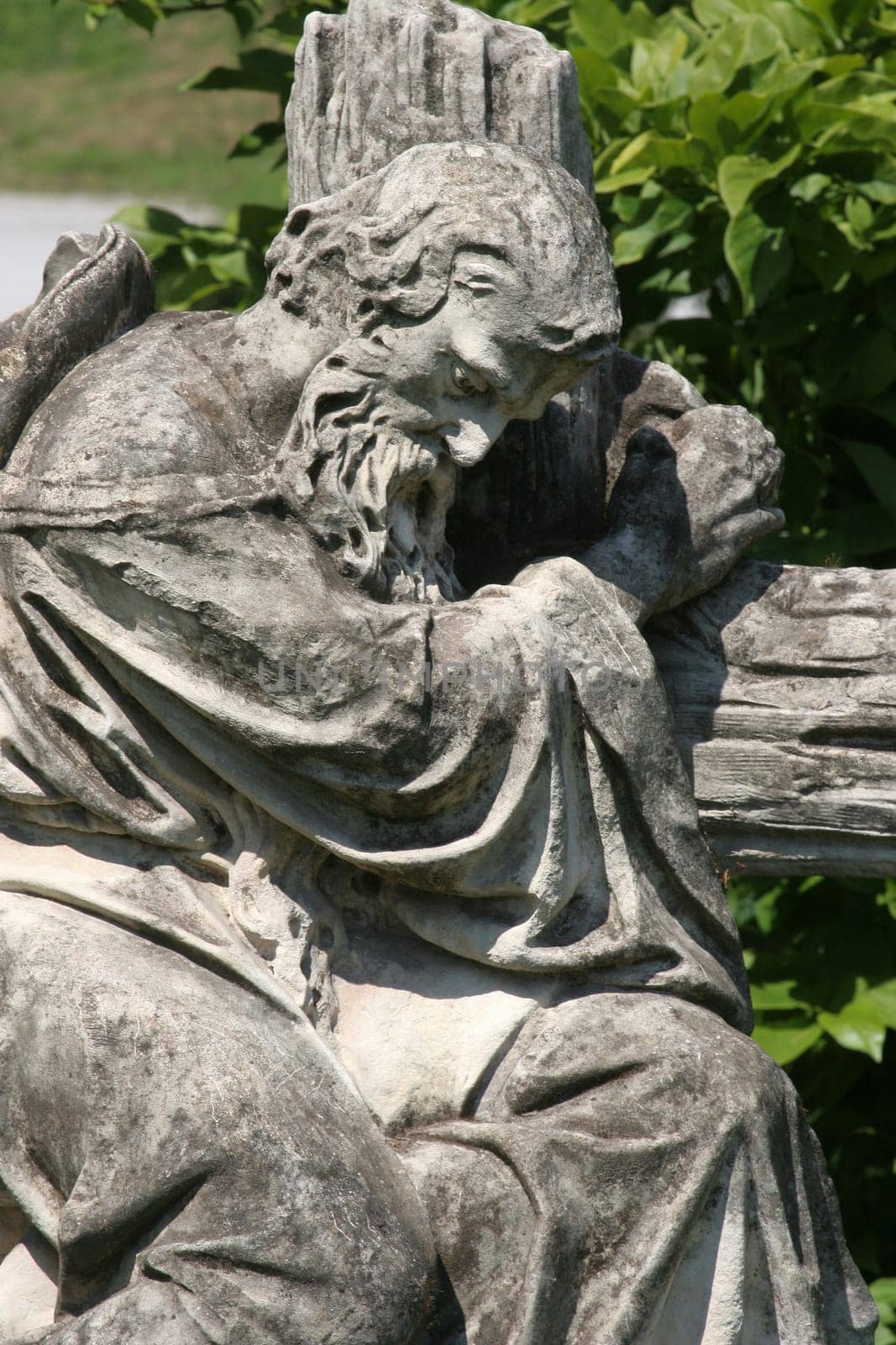 Tired pilgrim, statue in front of the National Shrine of Saint Joseph in Karlovac, Croatia