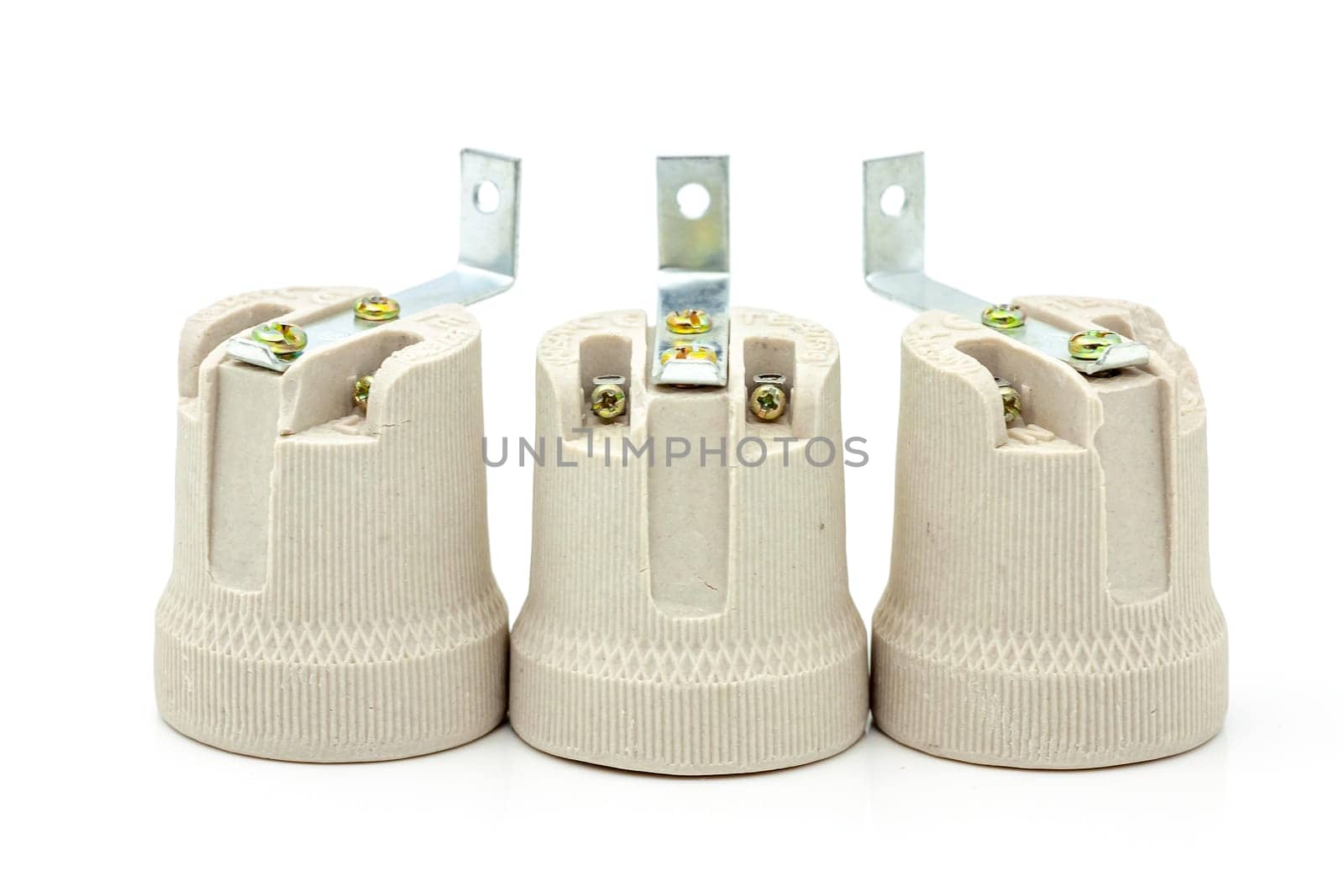 Electric ceramic socket model E27, for lighting. Selective focus with shallow depth of field.