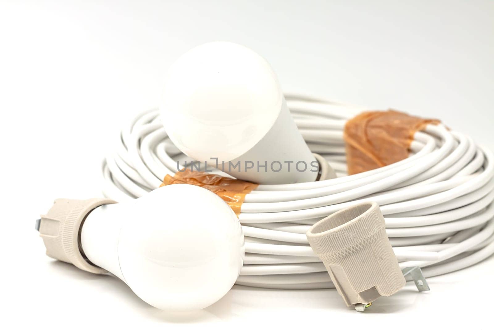 Electric ceramic socket model E27, for lighting. Selective focus with shallow depth of field.