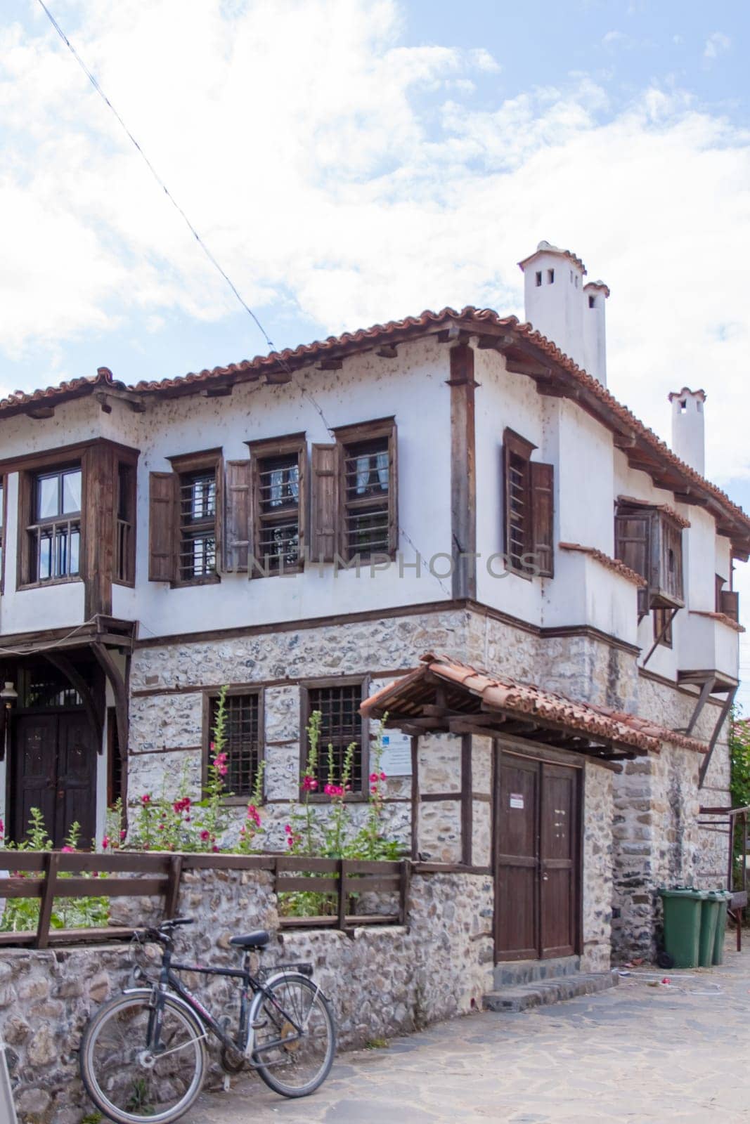 Zlatograd, Bulgaria - July 9,2021-Traditional Bulgarian house from the Revival era. Selective focus with shallow depth of field.