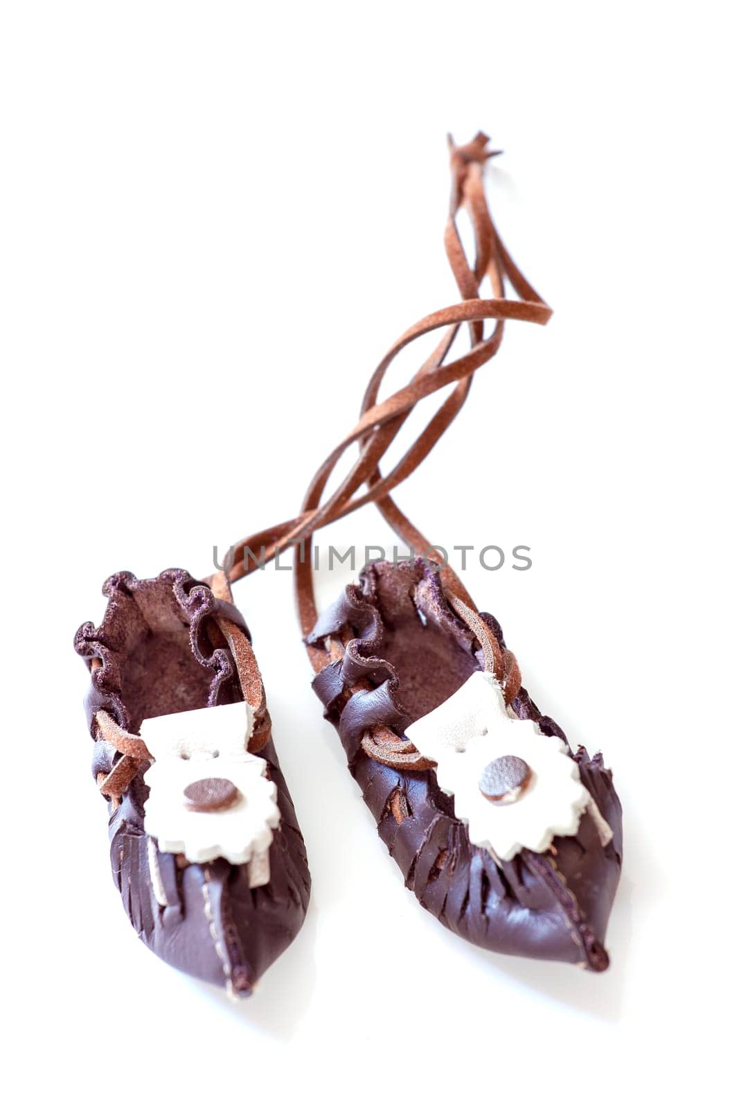 Traditional Bulgarian folk leather shoes - tsarvuli. Selective focus with shallow depth of field.
