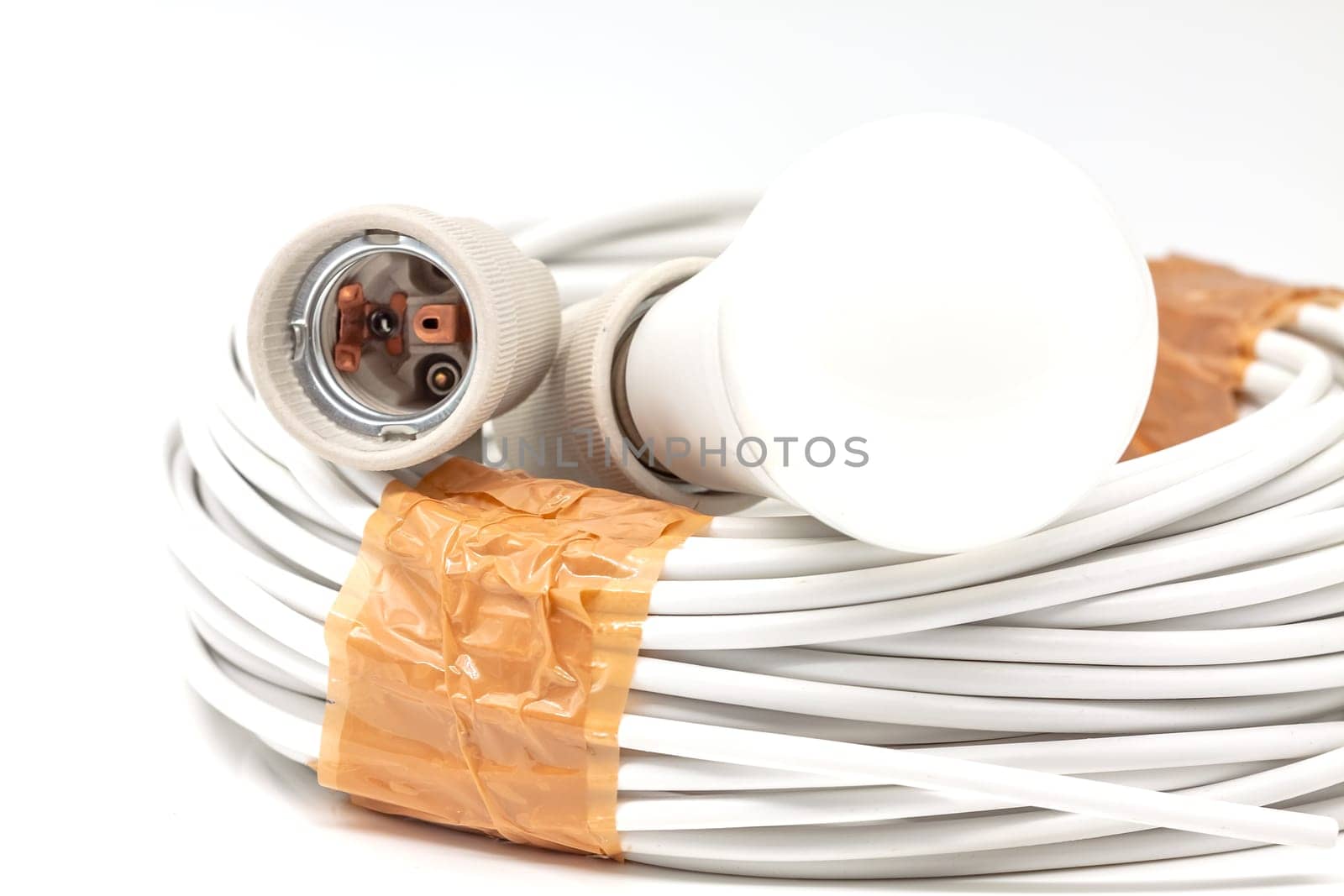Electric ceramic socket model E27, for lighting. Selective focus with shallow depth of field.