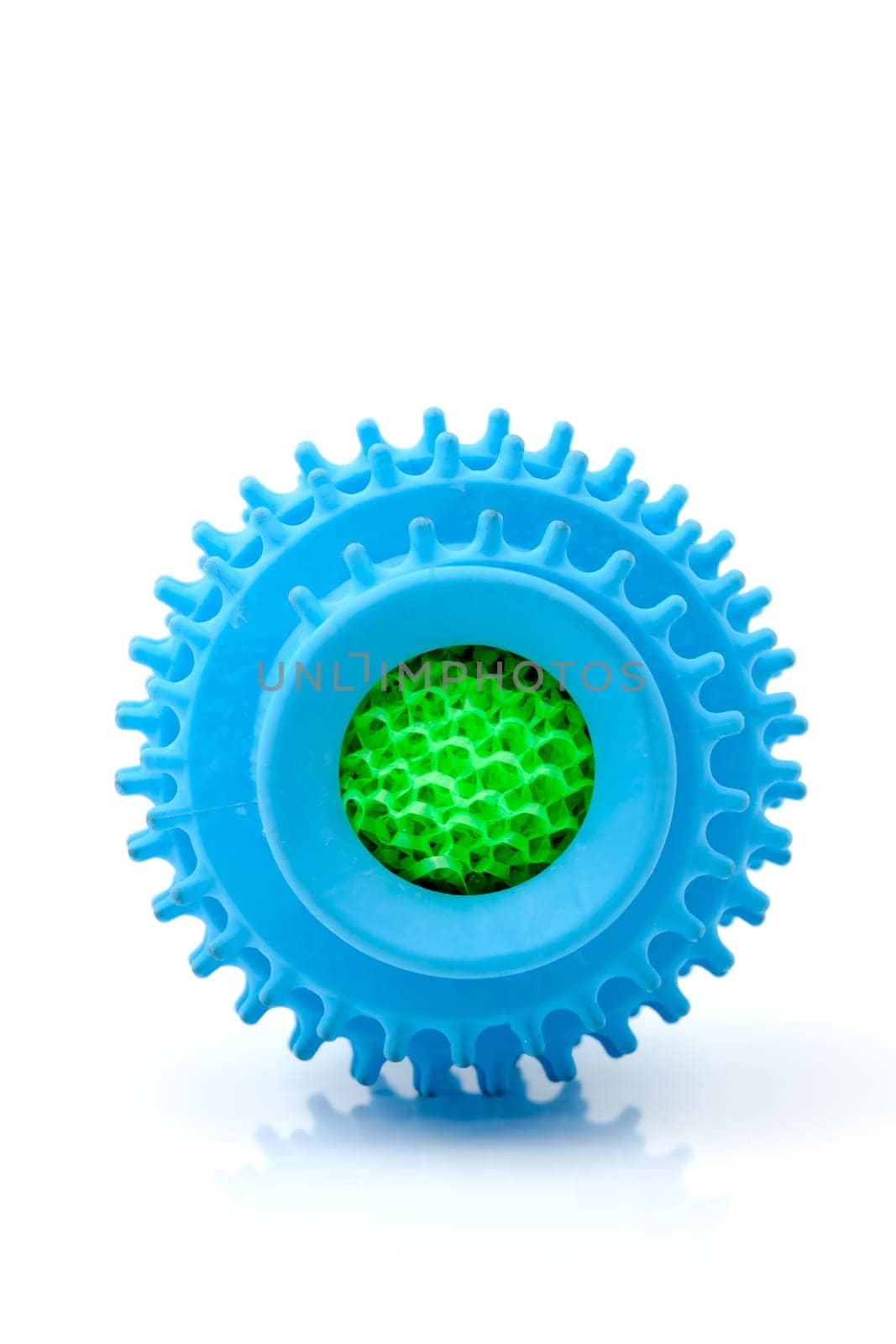 Silicone ball dryer removes moss from clothes and prevents creasing of clothes when drying. Selective focus with shallow depth of field.