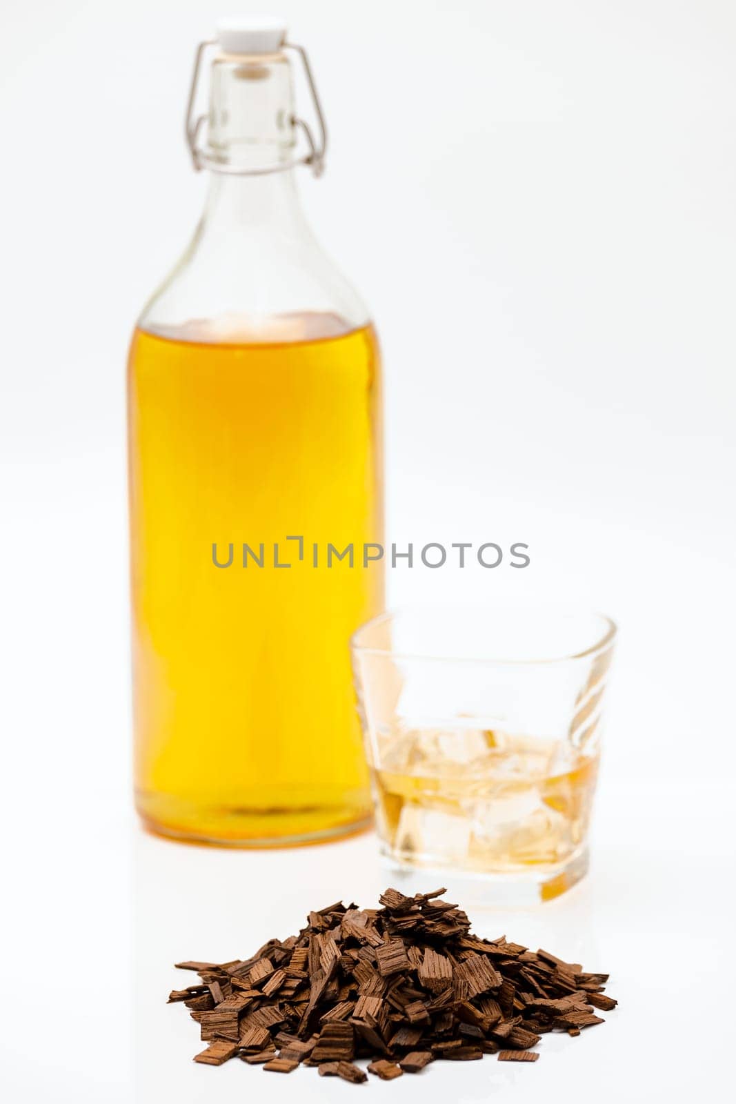 French oak chips heavy Тoast to enrich the taste and color of alcohol.Selective focus with shallow depth of field.