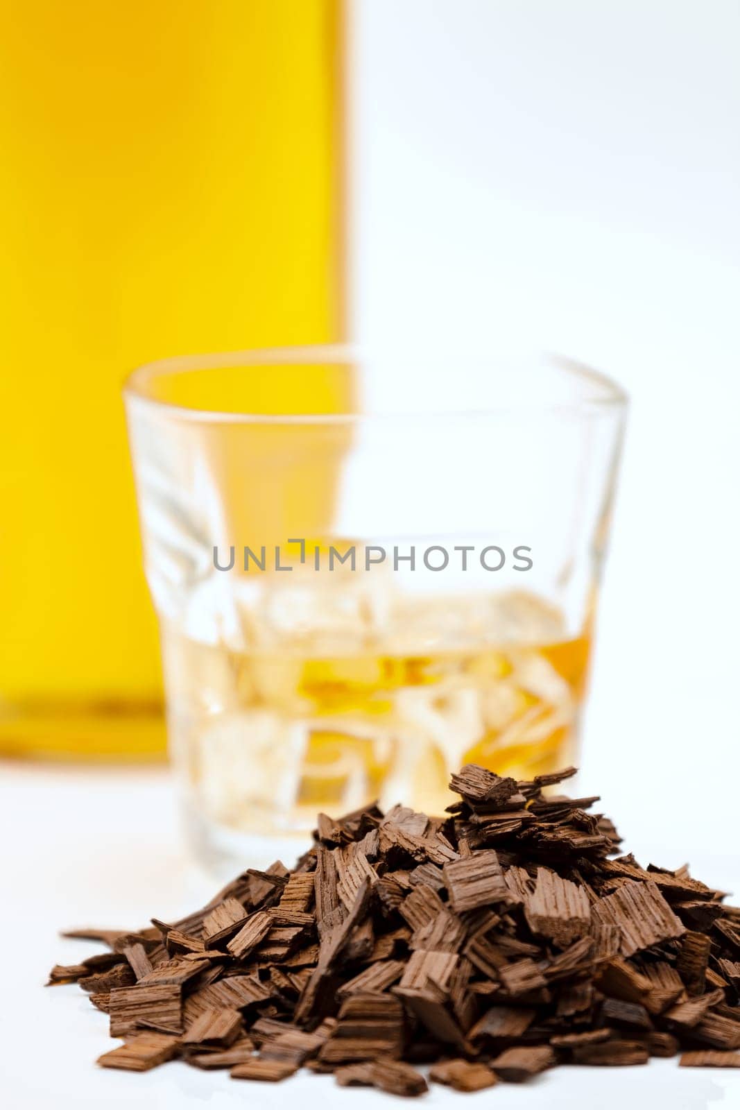 French oak chips heavy Тoast to enrich the taste and color of alcohol.Selective focus with shallow depth of field.