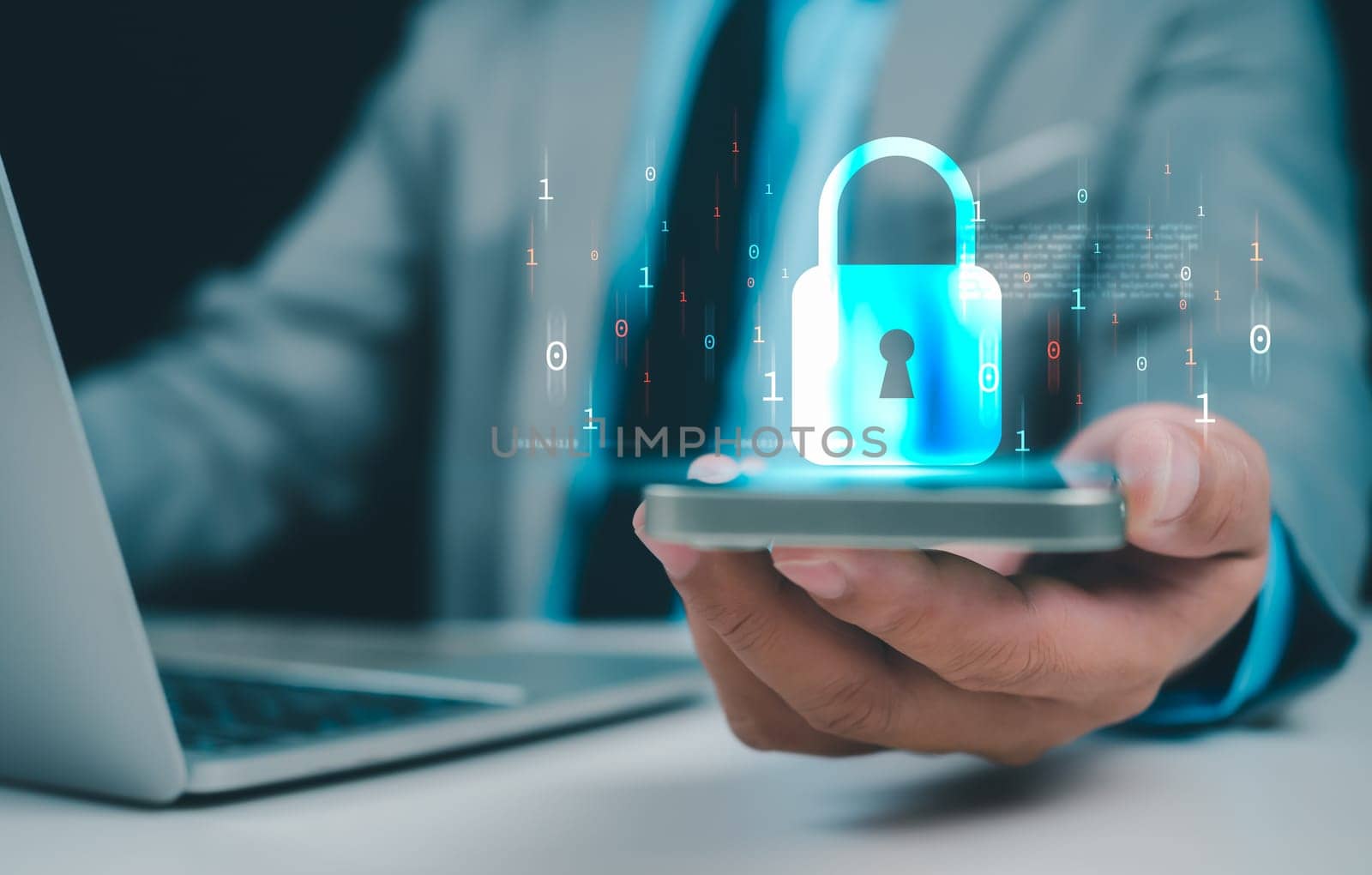 Businessman working on phone and computer online showing protection icons cyber espionage, Represents the code protection, Security concept and communication technology.